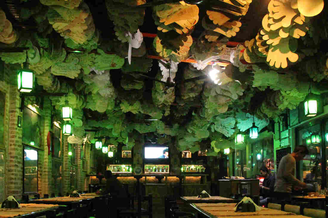 The walls of the Rum Doodle Bar and Restaurant in Kathmandu are lined with signatures of Everest summitters, including famous names like Edmund Hillary and record holders Apa Sherpa, Lhakpa Ghelu Sherpa and Babu Chiri Sherpa. Trekkers of smaller peaks sign their name on feet hanging from the ceiling.