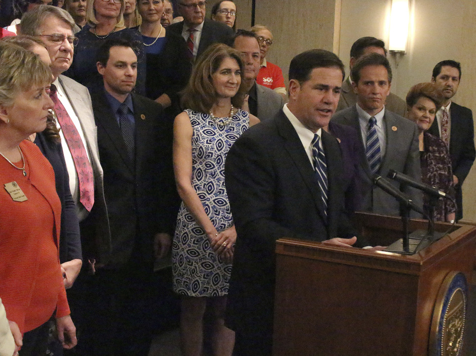 Arizona Gov. Doug Ducey on Thursday announced a 20 percent pay raise by the 2020 school year. (Bob Christie/AP)