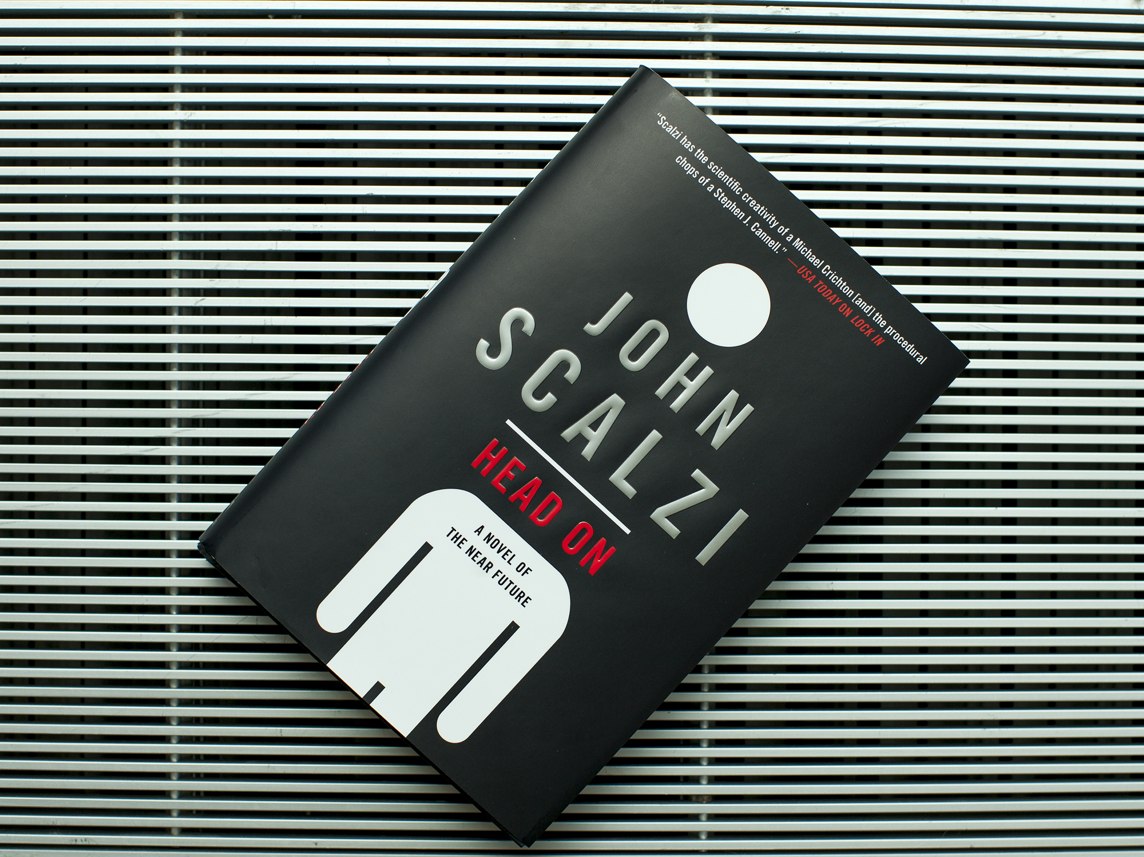 In 'Head On,' killer robots, dogged gumshoes ... and a very important cat