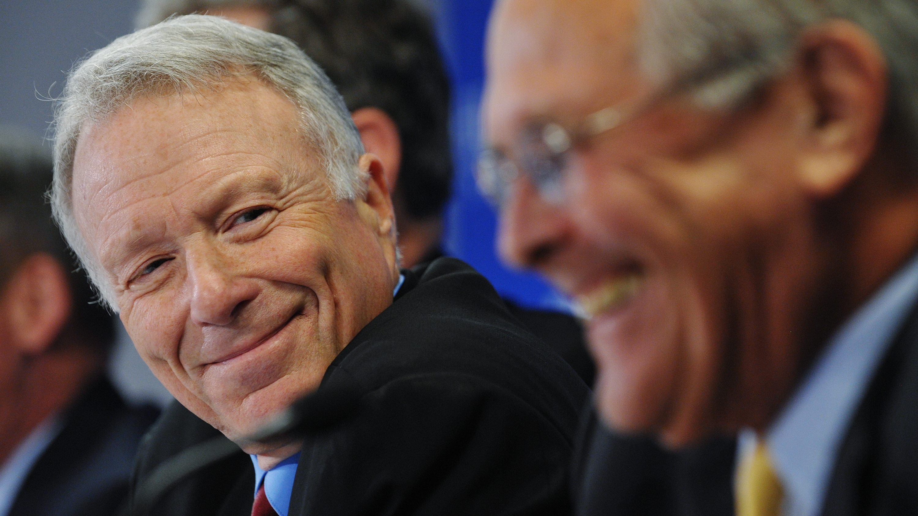 Lewis &quot;Scooter&quot; Libby, former chief of staff to Vice President Dick Cheney, shares a laugh with former Defense Secretary Donald Rumsfeld during a discussion at the conservative Hudson Institute. (AFP/Getty Images)