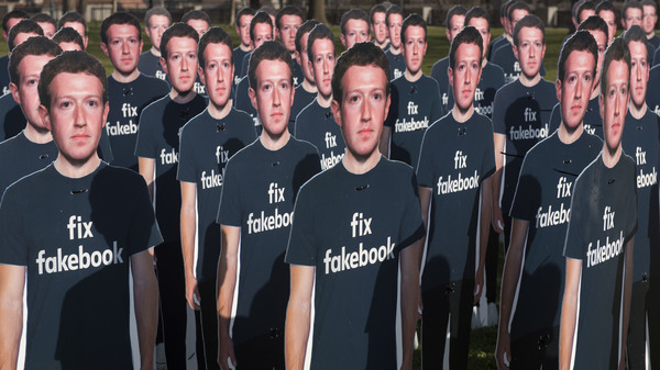 Cardboard cutouts of Facebook founder and CEO Mark Zuckerberg stand outside the U.S. Capitol in Washington as he testified before a Senate panel last week.