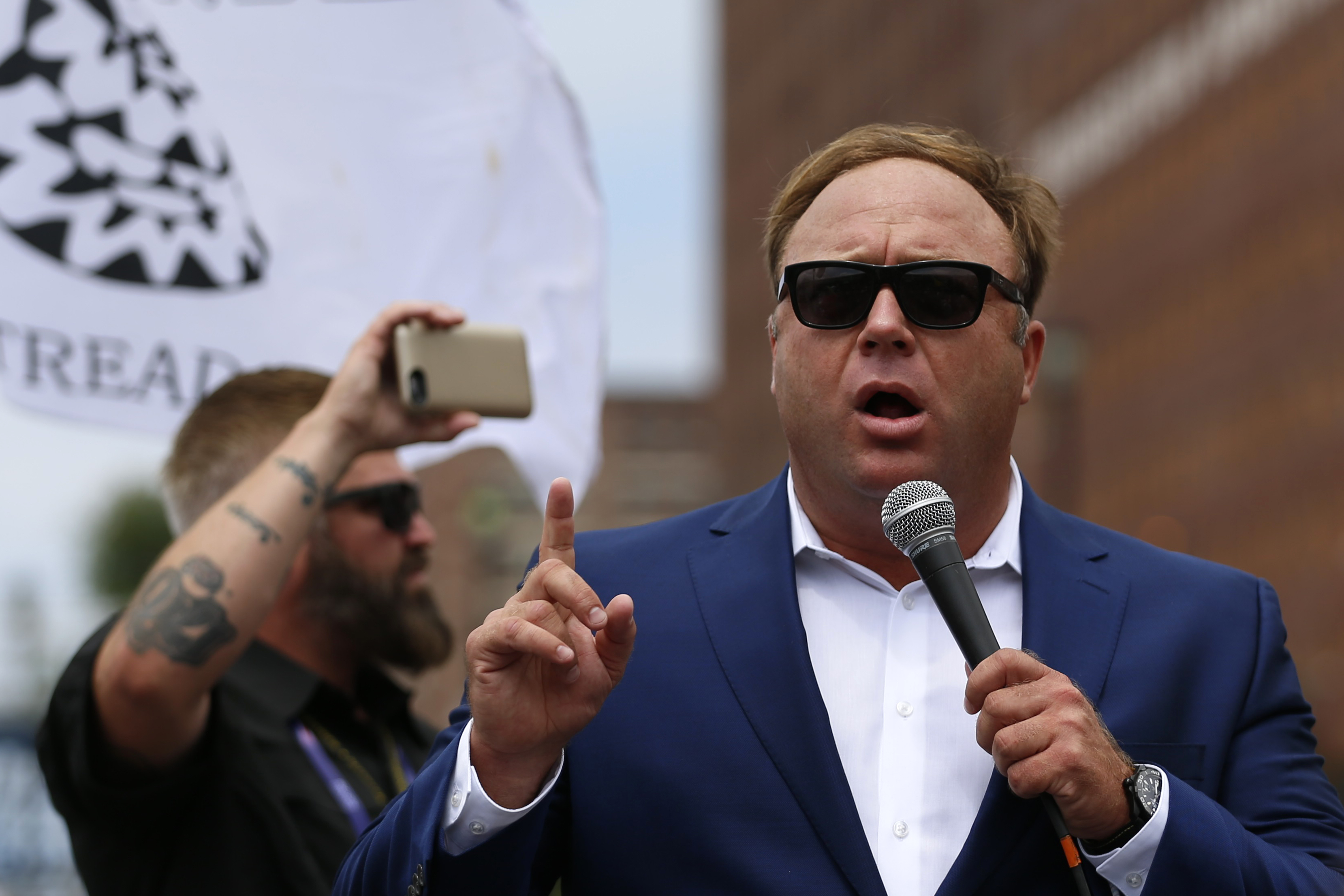 Alex Jones of InfoWars.com has questioned the authenticity of the Sandy Hook Elementary School shooting, and now the parents of two children killed in the massacre are suing him. (Reuters)