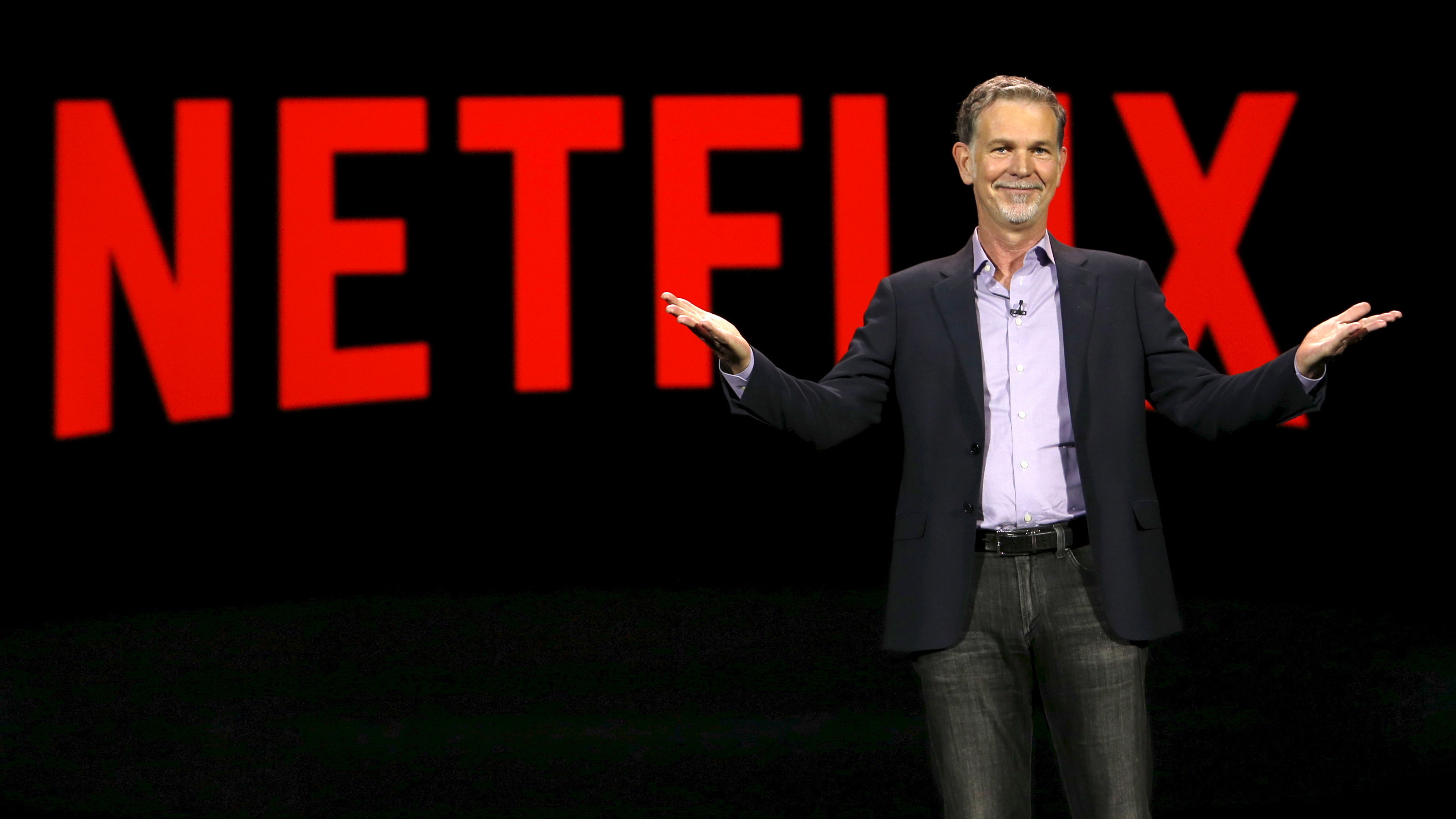 Netflix CEO Reed Hastings delivers a keynote address at the 2016 CES trade show in Las Vegas. Big entertainment rival Disney could challenge the service that made binge-watching popular.