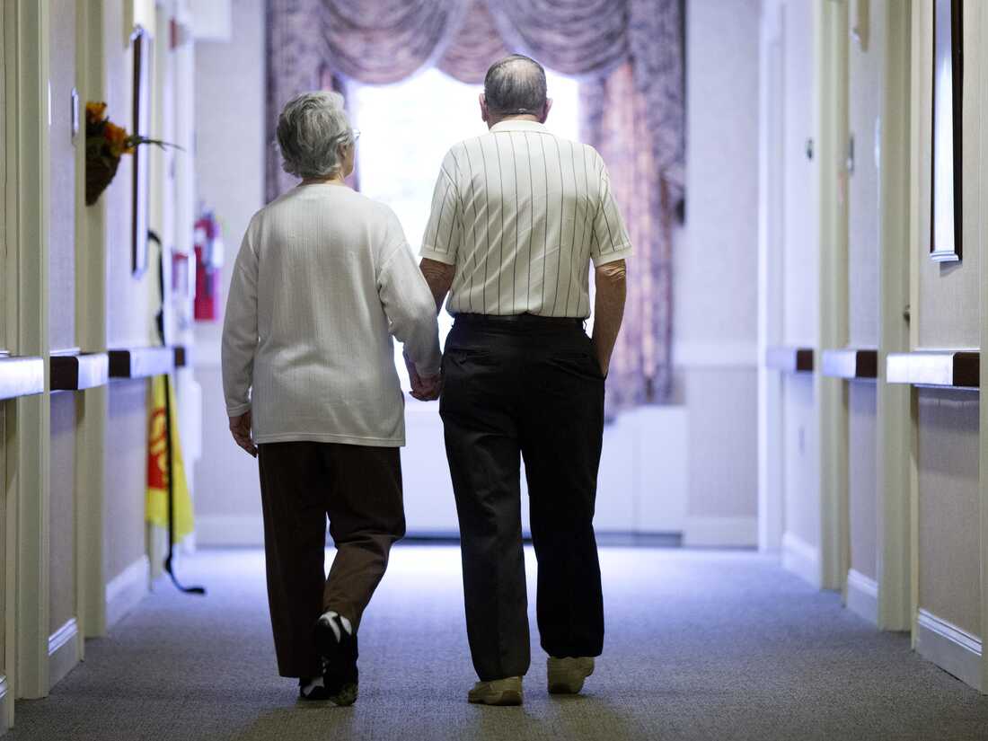 Residents walk the halls at the Easton Home in Easton, Pa.