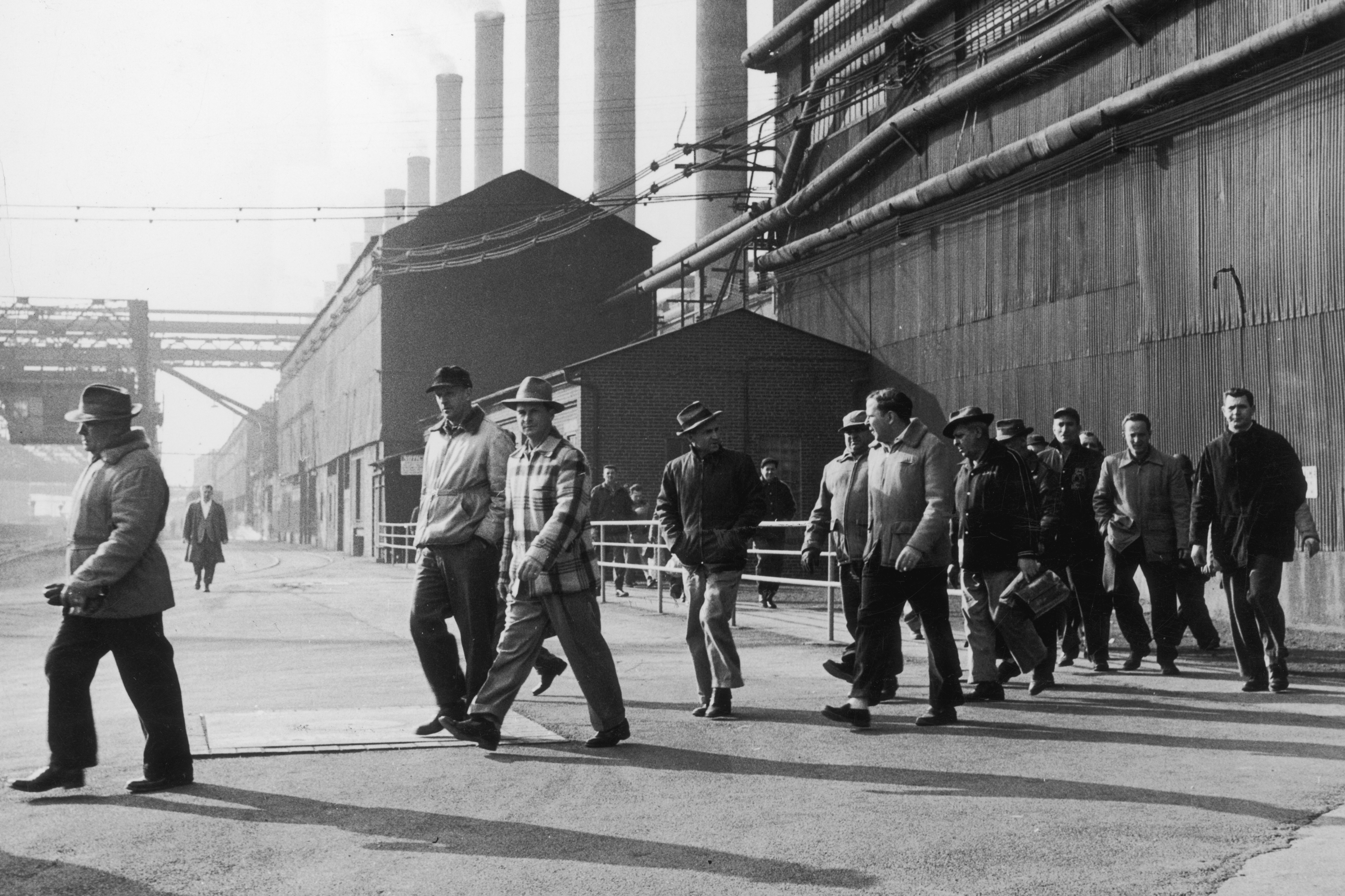 Steelworkers leave a plant at the end of their shift in Bethlehem, Pa., in 1947. Employment in the industry has declined by 80 percent from its peak six decades ago, according to author Douglas Irwin. (Getty Images)