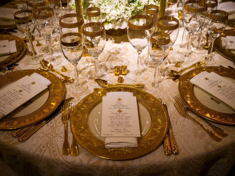 Dinner china is set before President Donald Trump and first lady Melania Trump host French President Emmanuel Macron and his wife, Brigitte Macron, for the first state visit of the Trump administration, in the State Dinning room of the White House, on April 23, 2018 in Washington, DC. (Al Drago/Getty Images)