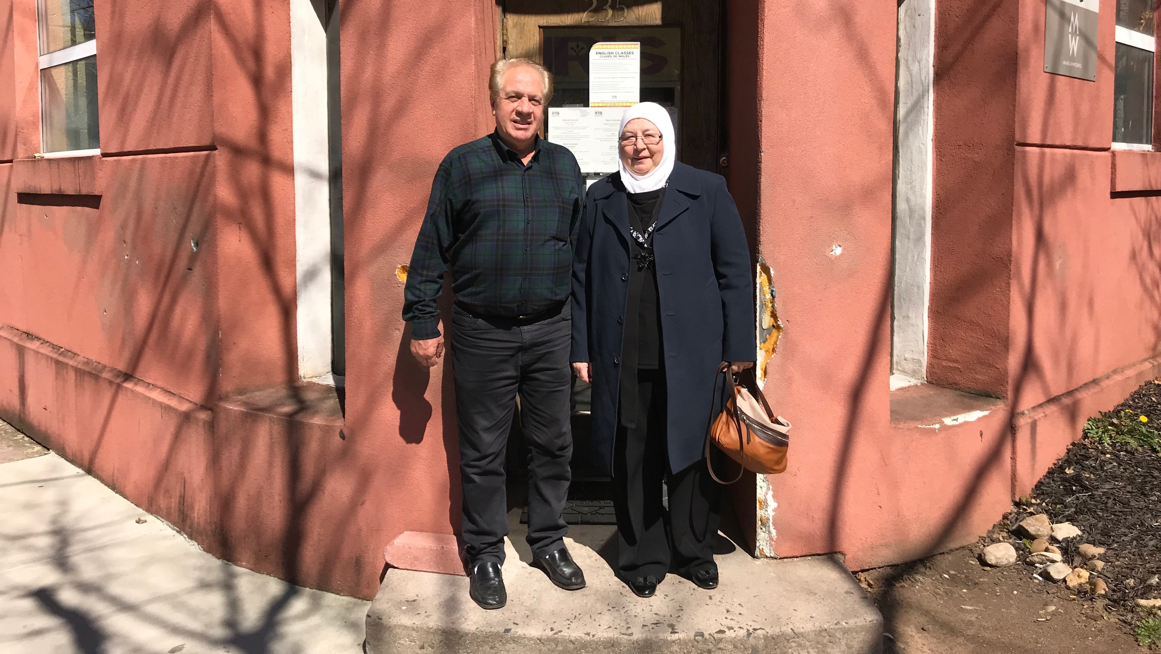 Haitham Dalati, left, and his wife Shiyam Daghestani, outside the offices of Integrated Refugee & Immigrant Services in New Haven, Conn. (NPR)