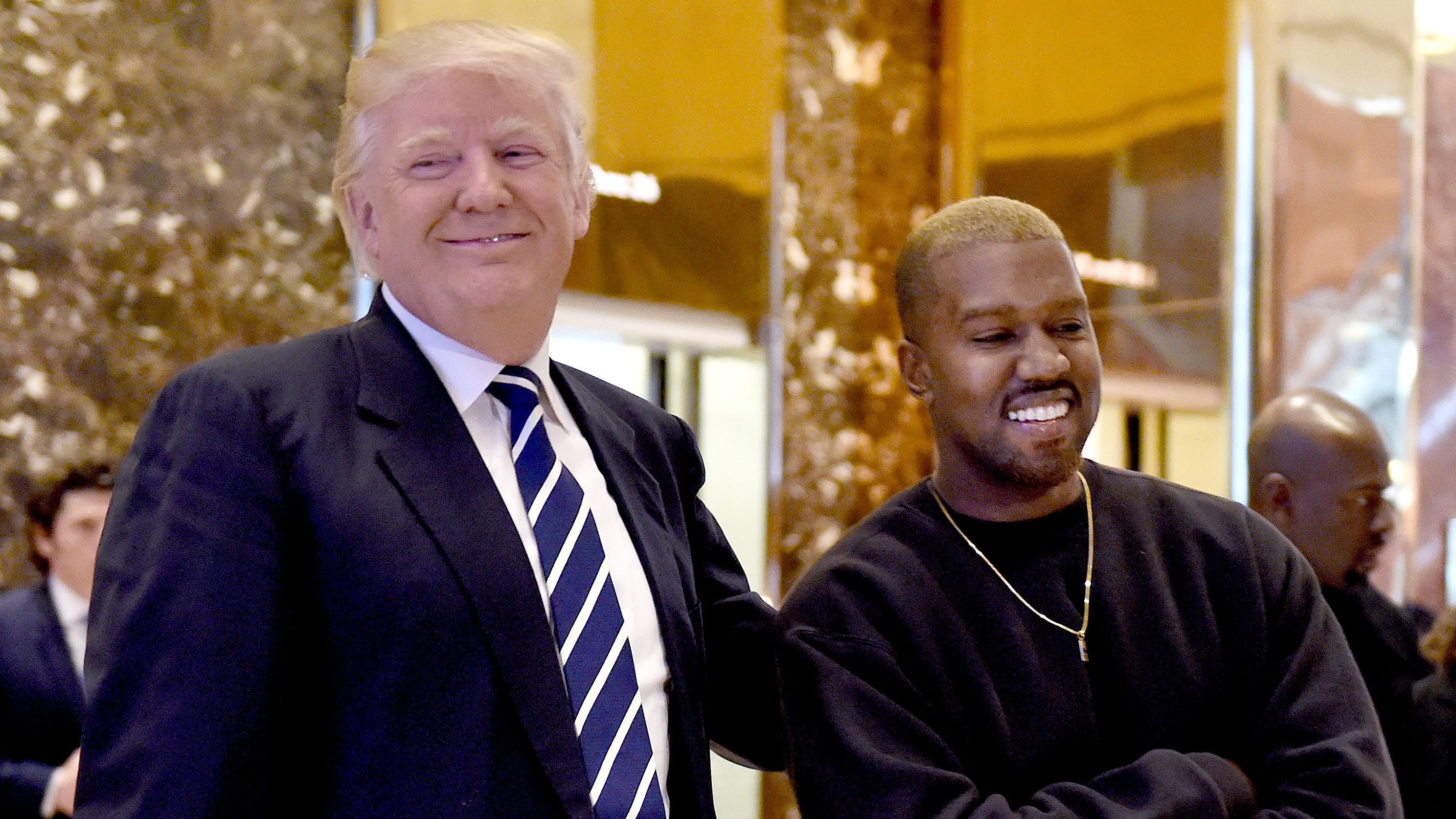 With two new songs, Kanye West shows his affinity for President Trump and the art of the troll. (AFP/Getty Images)