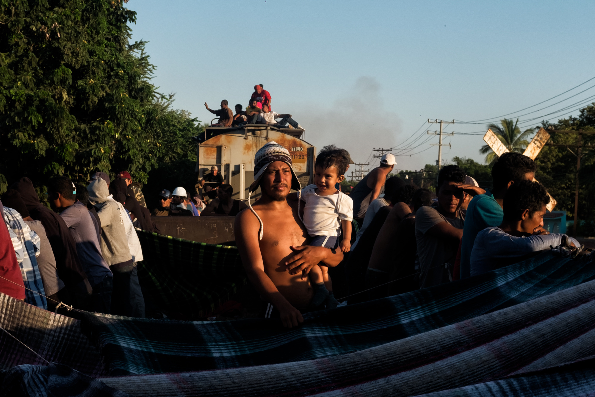 José, 30, carries his 1-year-old son, Mateo, as they arrive in Mazatlán, Sinaloa, Mexico, Oct. 24, 2017. On Nov. 10, José and 35 others turned themselves in at the San Ysidro Port of Entry, seeking asylum. His partner, Olivia, and other son, Andrée, are currently staying in Tijuana. (We have omitted the last names of the subjects in this story to protect their identities.)