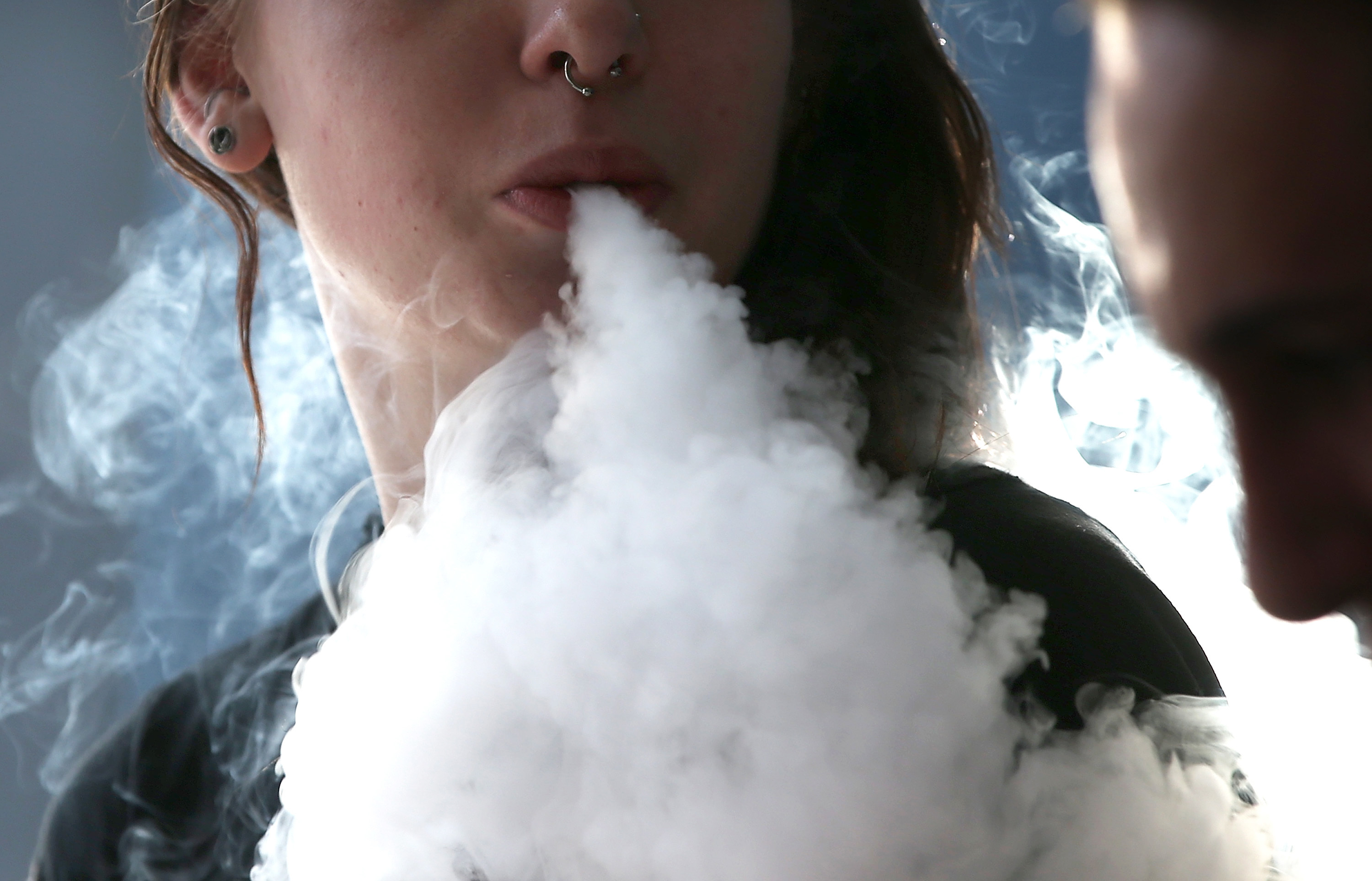 Nicotine, heavy metals and tiny particles that can harm the lungs have been found in e-cigarette aerosol, according to the <a href=&quot;https://e-cigarettes.surgeongeneral.gov/knowtherisks.html#aerosol-exposure&quot;>surgeon general</a>. (Getty Images)