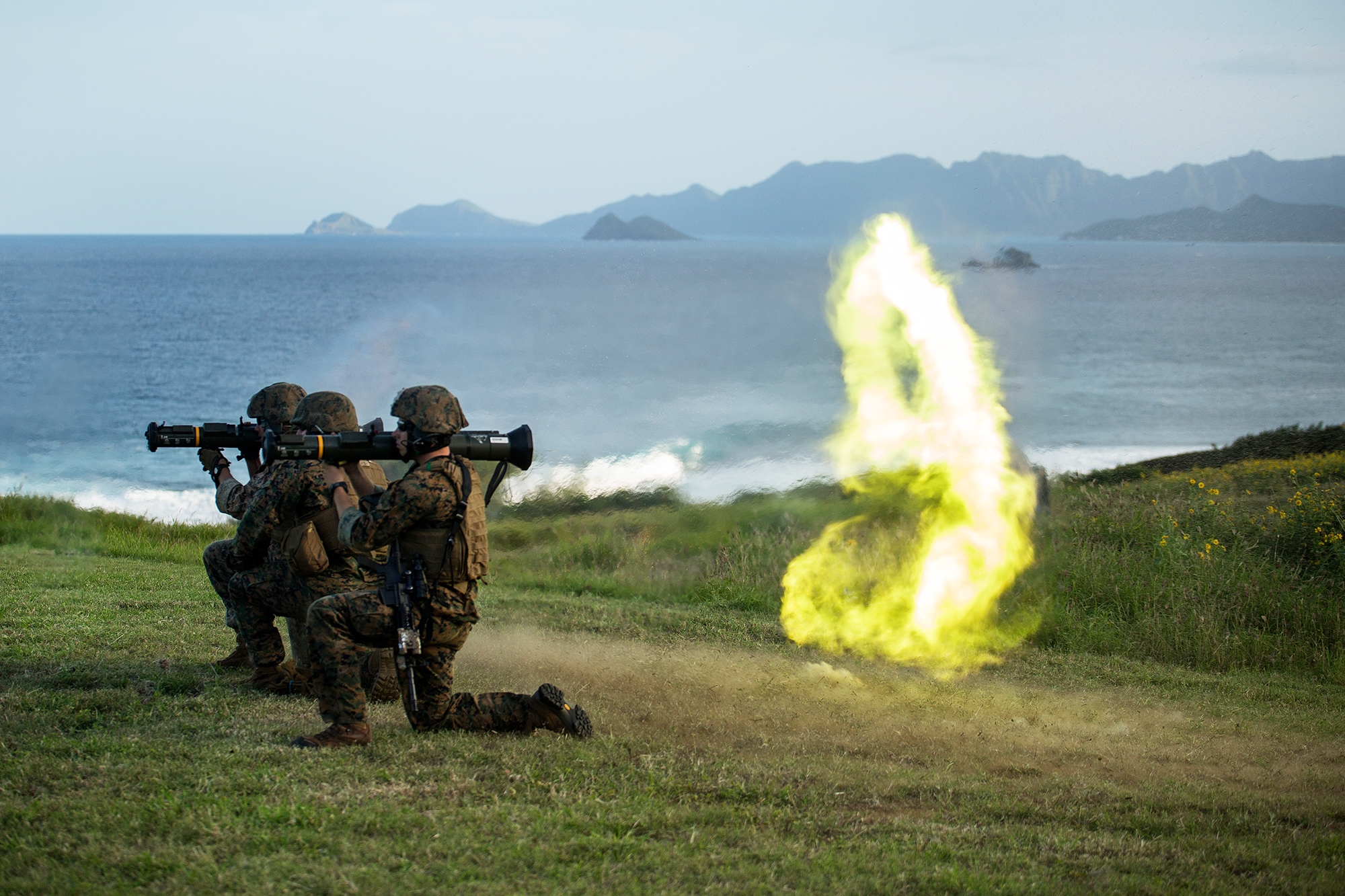 Marines based in Okinawa, Japan, fire an M136 AT-4 rocket launcher as part of a weapons training exercise on the Kaneohe Bay Range Training Facility, in 2014. (U.S. Marines/DVIDS)