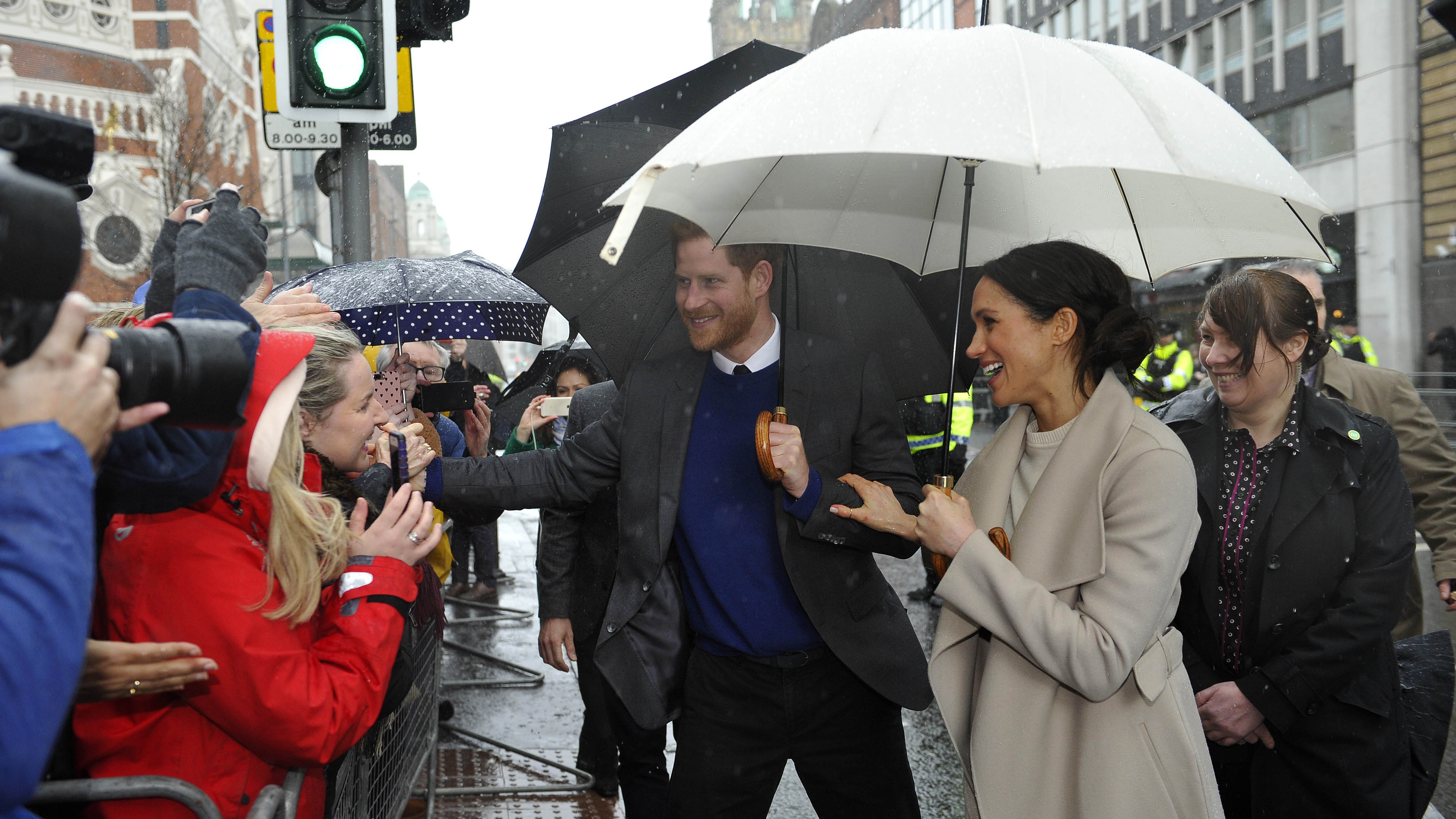 Prince Harry and Meghan Markle greet well-wishers in Belfast, Northern Ireland, in March.