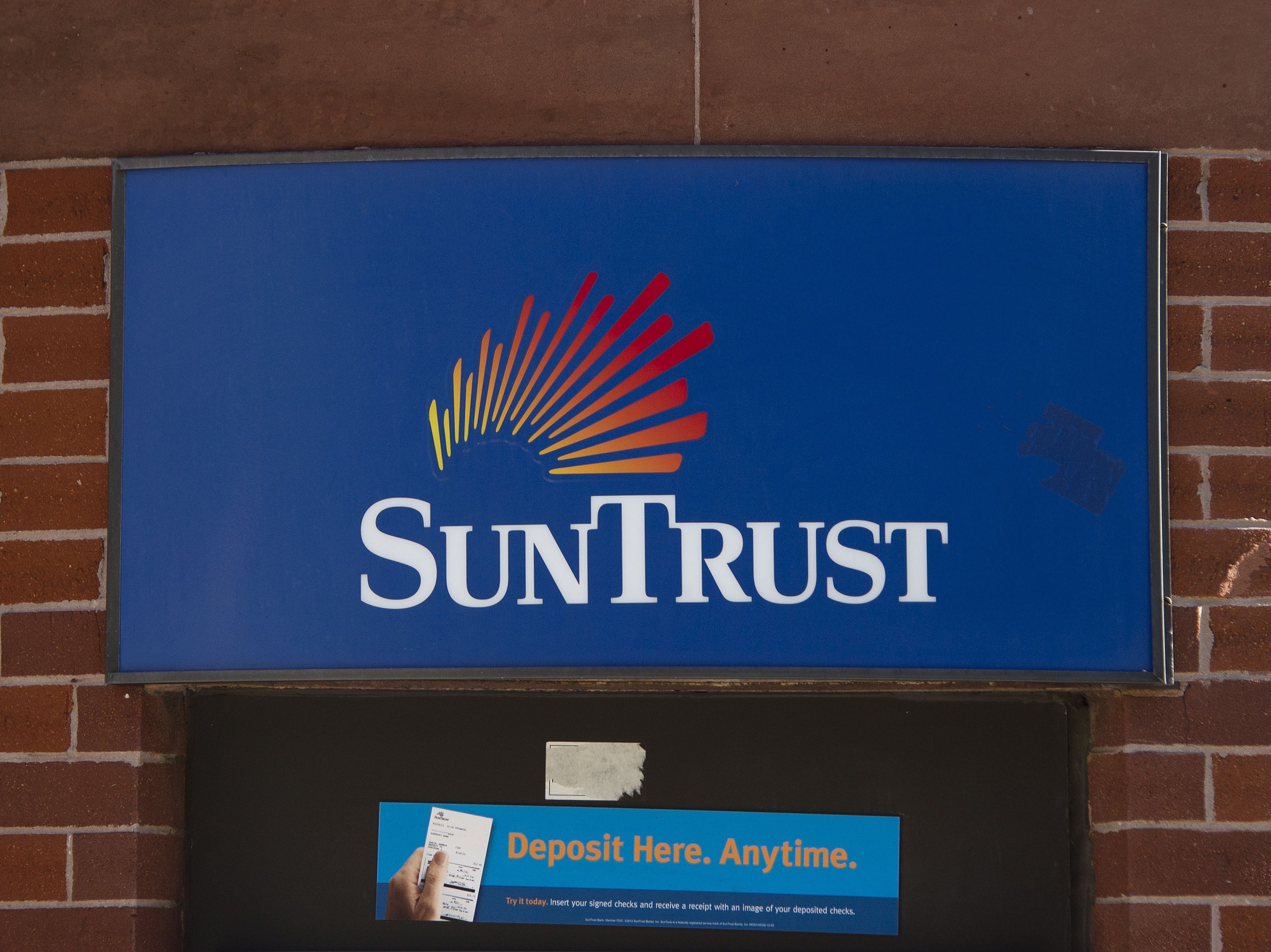 Under legislation approved by the House on Tuesday, SunTrust and other banks with up to $250 billion in assets could be exempted from the toughest rules of the Dodd-Frank law. (AFP/Getty Images)