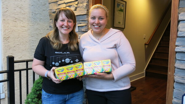 Johanna Humphrey, left, ended up with 24 boxes of crayons she didn