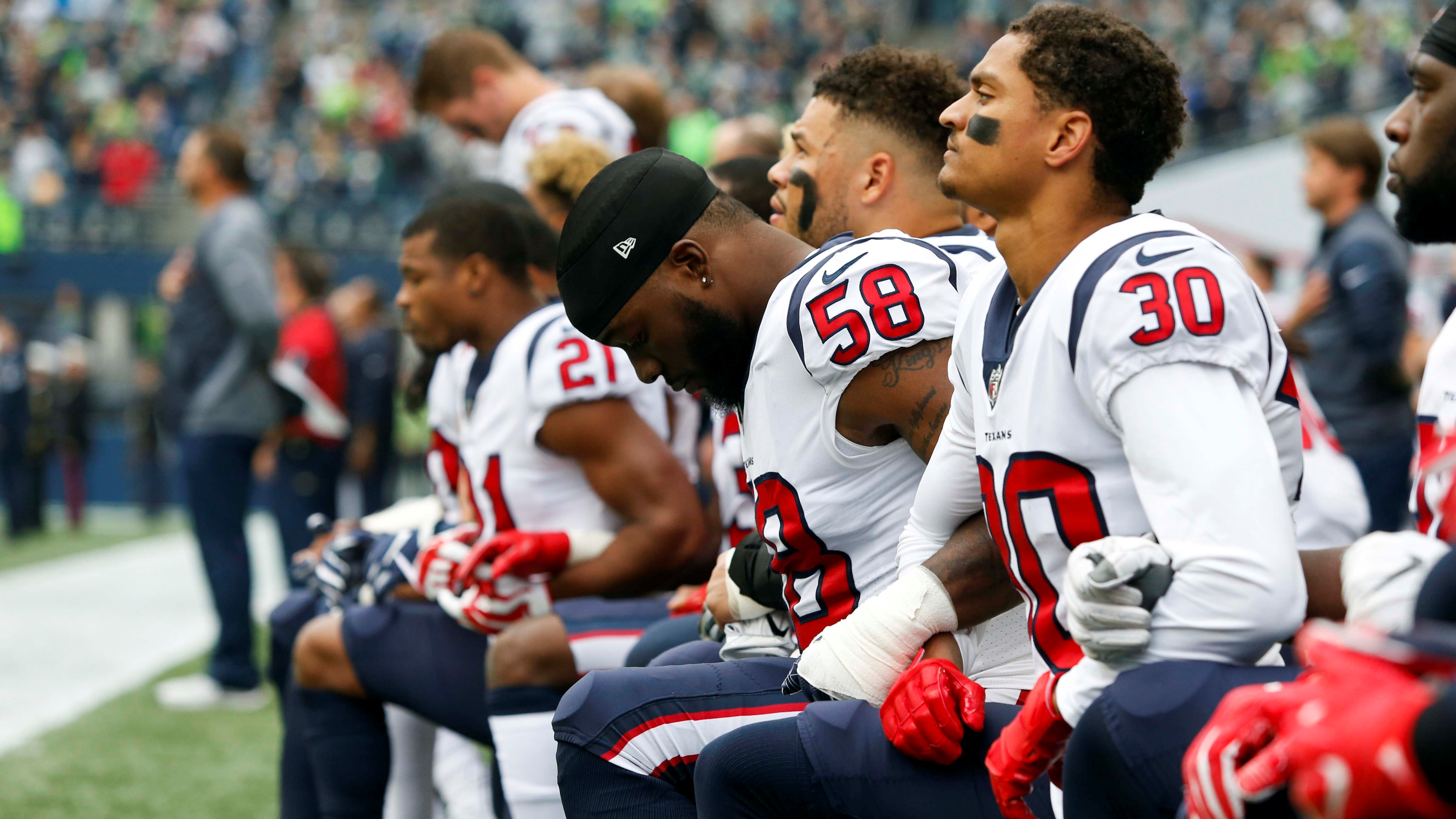 NFL players from the Houston Texans and other teams chose to take a knee during the national anthem before kickoffs in the 2017 season. (USA TODAY Sports)
