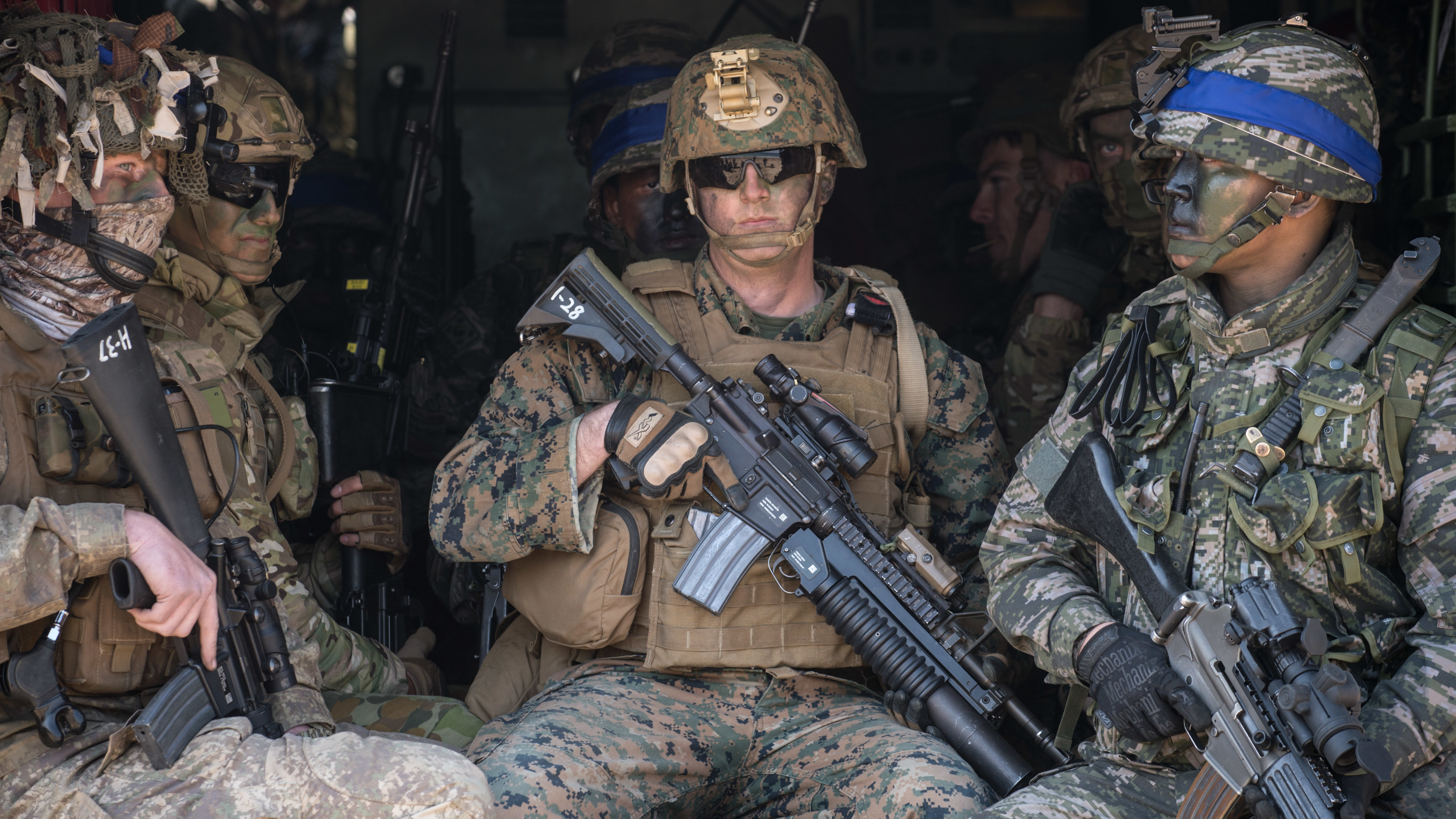 U.S. and South Korean soldiers sit inside an amphibious vehicle during an annual joint military landing exercise in Pohang, on South Korea