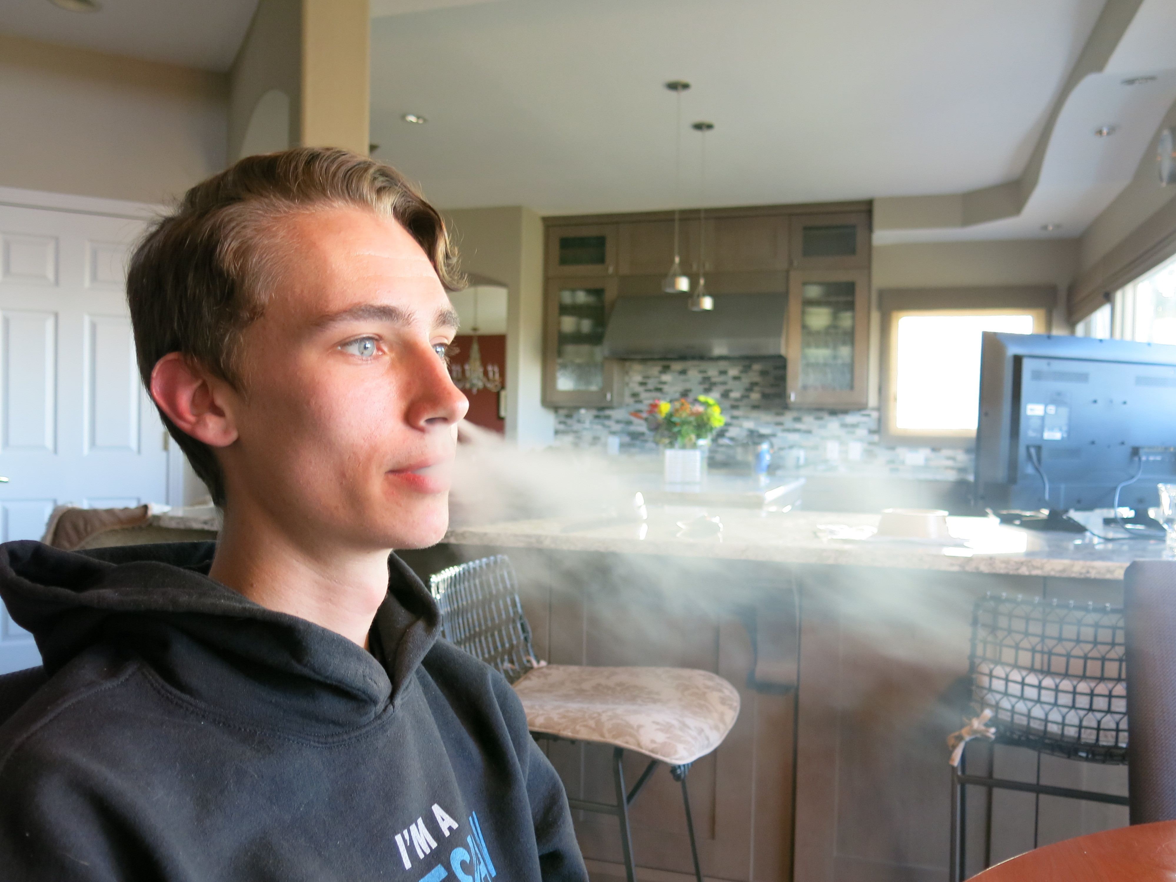 Julien Lavandier, a Colorado State University student, started smoking e-cigarettes as a high school sophomore. He says he's now hooked on Juul and has been unable to quit. (John Daley / CPR News)