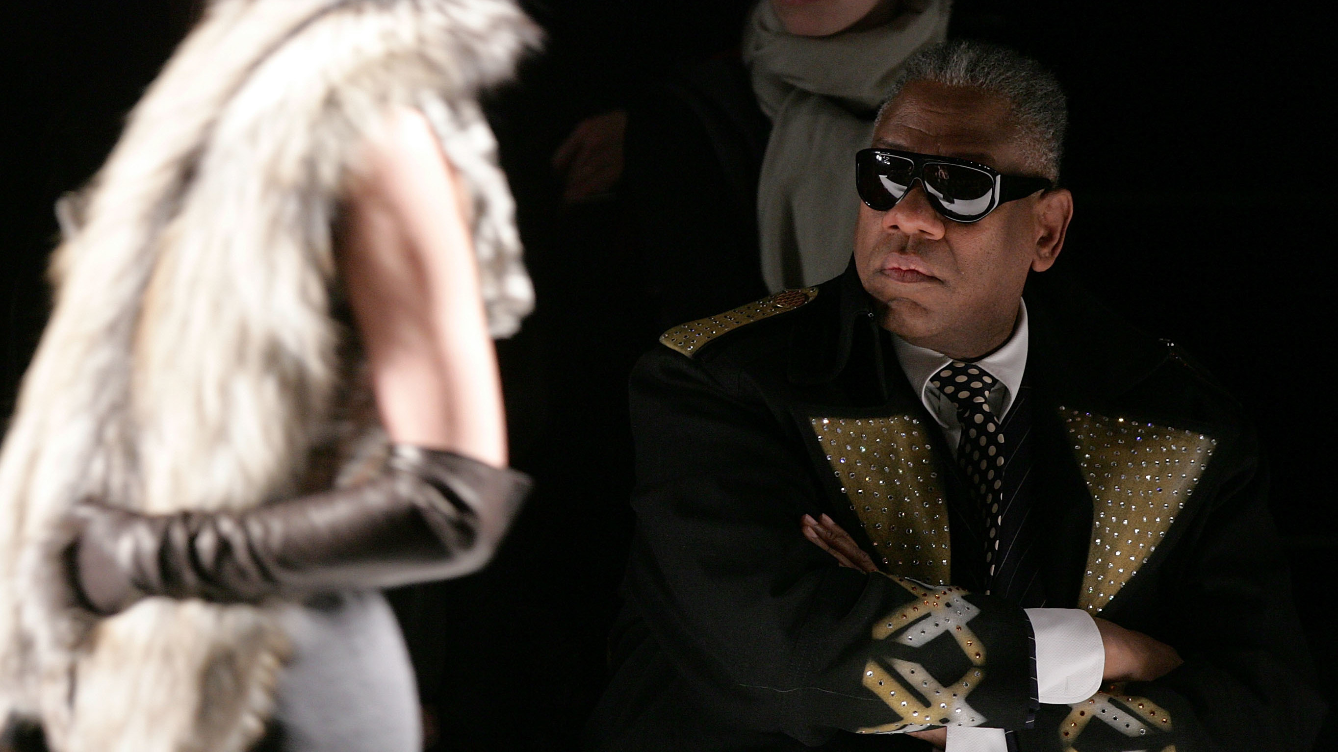 André Leon Talley remembers paging through <em>Vogue</em> for the first time as a child — it was like falling down a &quot;rabbit hole&quot; into &quot;a world of glamour,&quot; he says. Talley is the subject of a new documentary called <em>The Gospel According to André. </em>He is shown above at the Carolina Herrera Fall 2007 fashion show. (Getty Images For IMG)