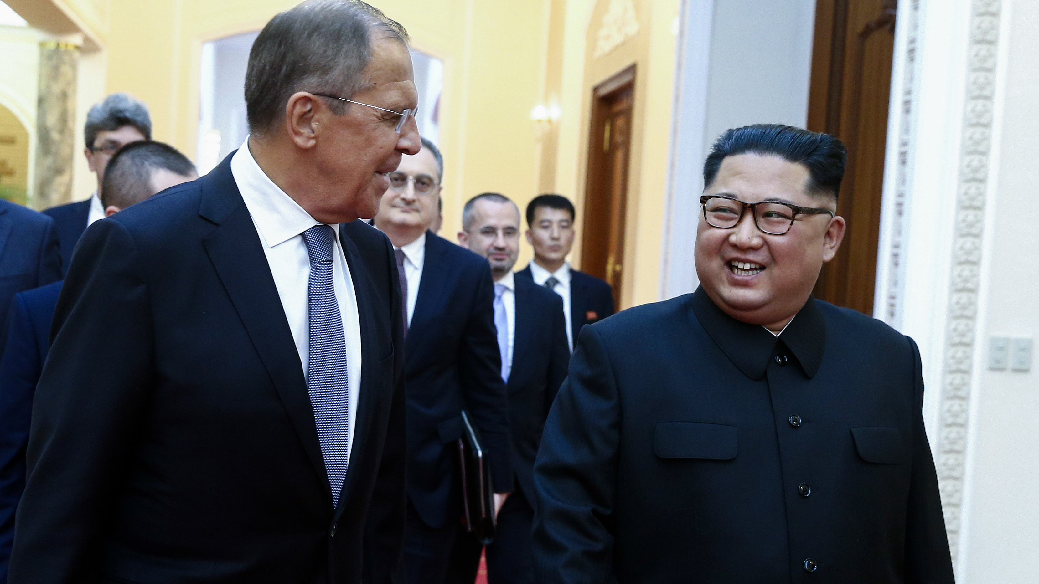 Russian Foreign Minister Sergey Lavrov walks with North Korean leader Kim Jong Un in Pyongyang during their meeting on Thursday. (AFP/Getty Images)