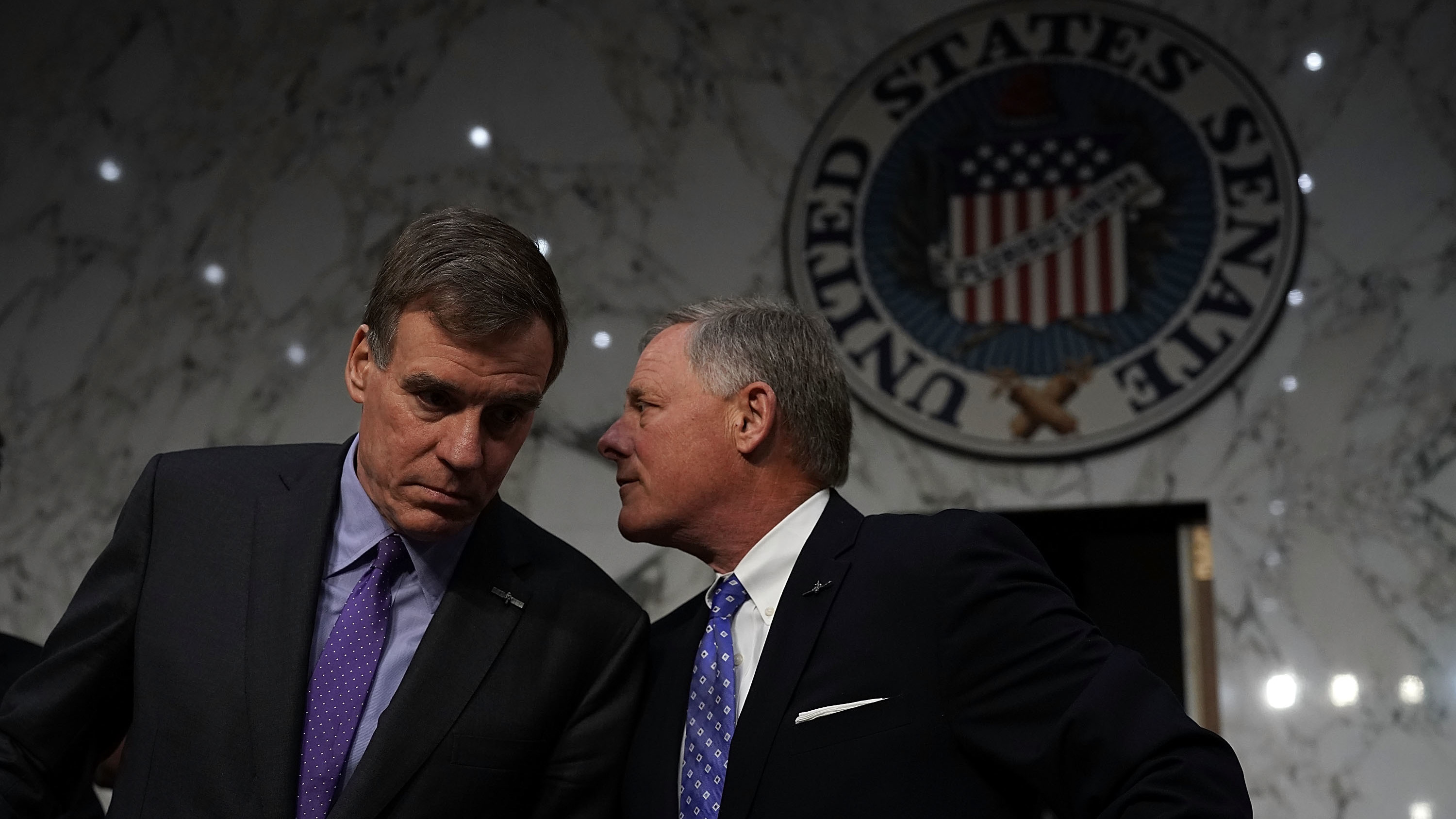 The Senate intelligence committee, led by Vice Chairman Mark Warner (left) and Chairman Sen. Richard Burr, appears to have arrived at a partisan deadlock over whether Donald Trump's campaign conspired with the Russian attack on the 2016 presidential election. (Getty Images)