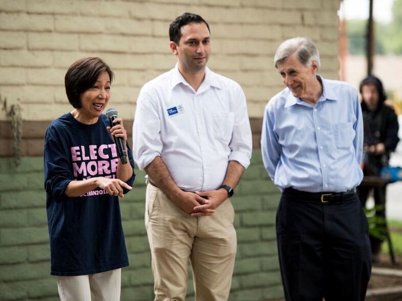 Democrats running for the California 39th Congressional district, from left, Mai Khanh Tran, Sam Jammal and Andy Thorburn, speak to voters during a rally held by Swing Left at Carolyn Rosa Park in Rowland Heights, Calif., on May 19. (Bill Clark/CQ-Roll Call/Getty Images)