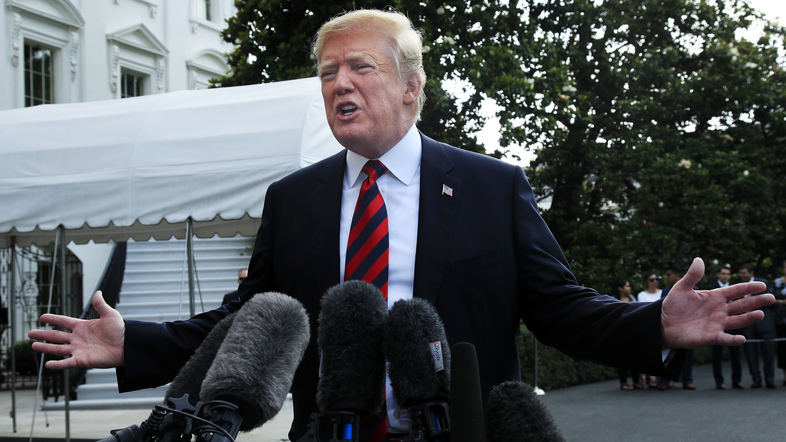President Trump speaks to reporters before leaving the White House on Friday to attend the G-7 Summit in Charlevoix, Quebec. (Manuel Balce Ceneta/AP)