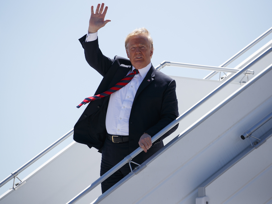 President Donald Trump steps off Air Force One as he arrives for the G-7 summit in Canada on June 8. (Evan Vucci/AP)