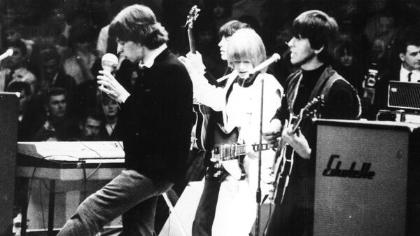 The Rolling Stones performing in  Berlin in 1965. The band's 1965 hit "(I Can't Get No) Satisfaction" made heavy use of Glenn Snoddy's fuzz tone.