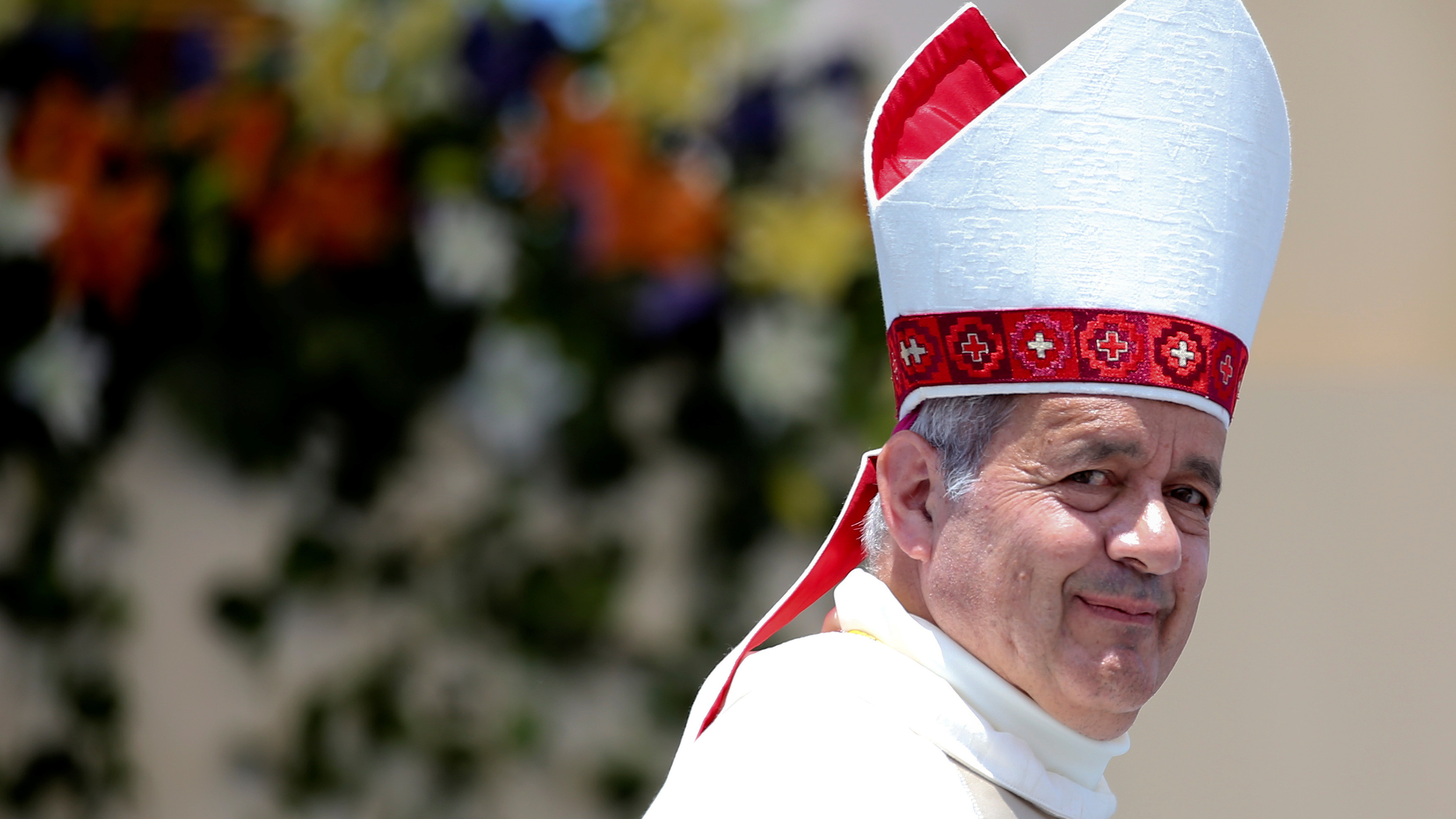 Bishop Juan Barros, long accused of helping to cover up a notorious sex abuse case in the Catholic Church in Chile, has resigned. He's seen here during Pope Francis's visit to Chile in January. (Reuters)
