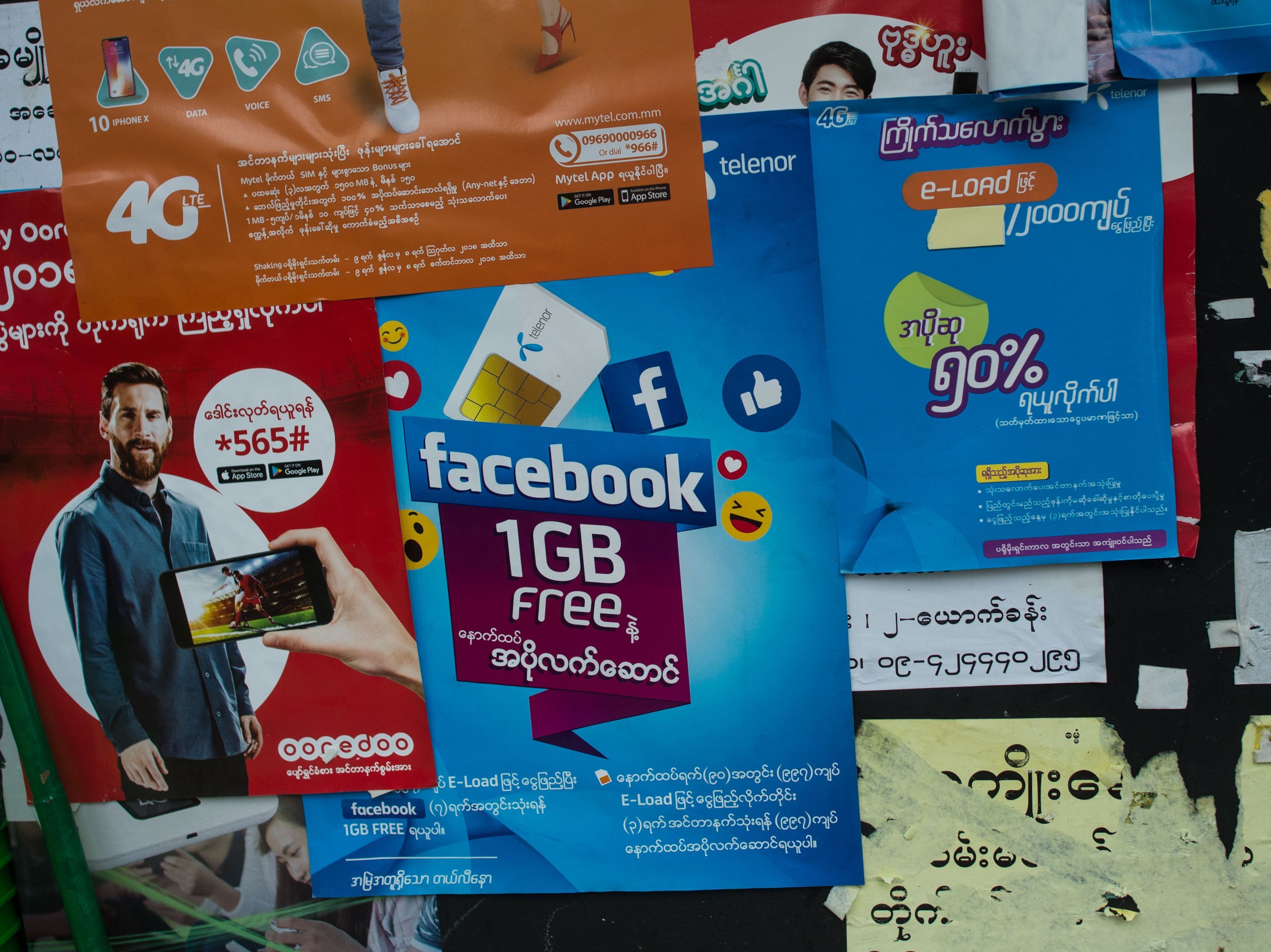 The Facebook logo is seen on an advertisement by a local telecom company in Yangon. &quot;People think that Facebook is the Internet. It comes pre-installed on the phones that they buy,&quot; says a Yangon-based digital activist. There are an estimated 27 million Facebook accounts in Myanmar. (AFP/Getty Images)