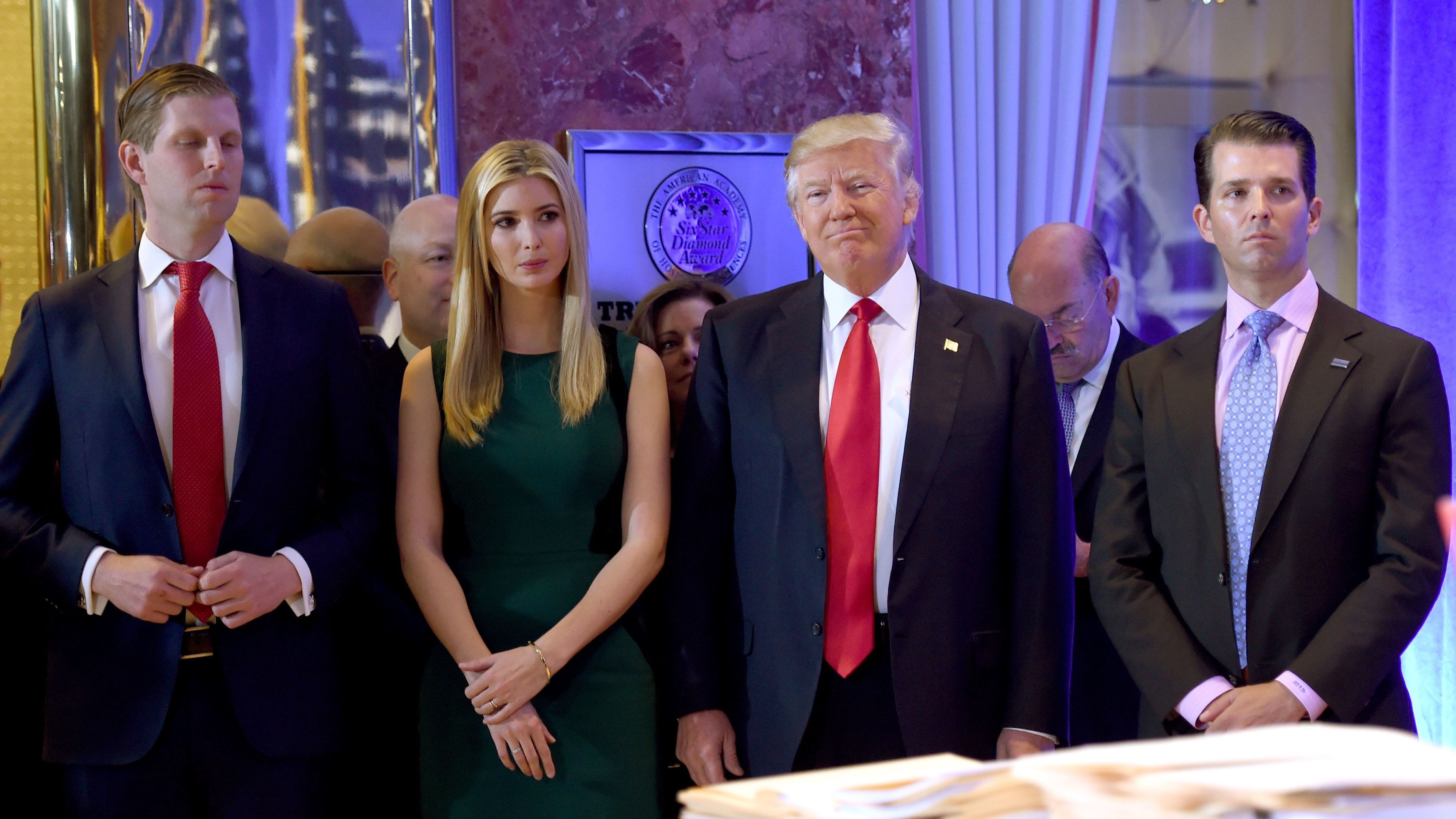 President Trump, pictured with his children Eric, Ivanka and Donald Jr. in January 2017, said Thursday on Twitter that &quot;I won't settle this case!&quot; (AFP/Getty Images)
