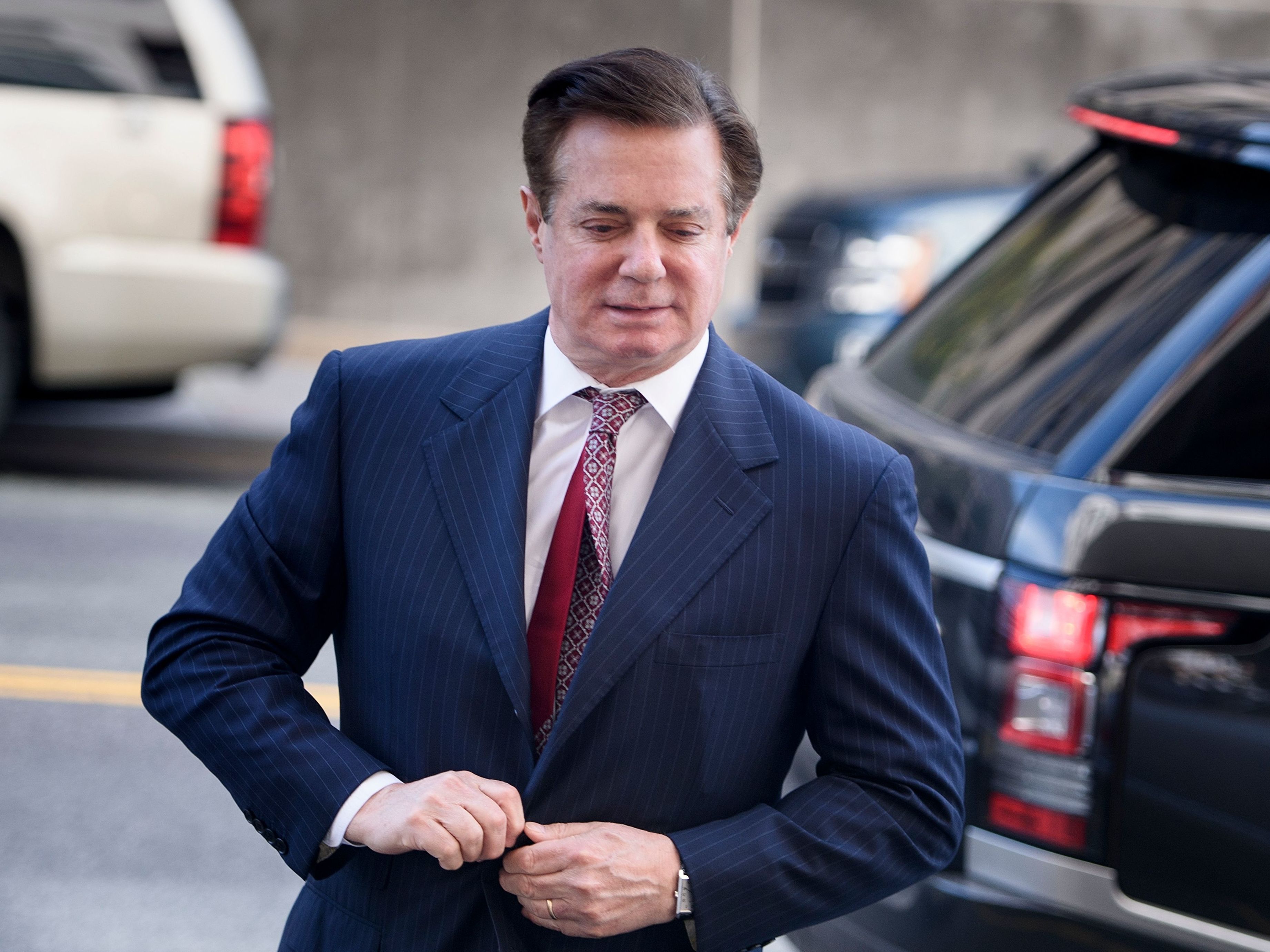 Paul Manafort arrives for a hearing at District Court in Washington, D.C., on Friday. A judge ordered him to jail ahead of his trial in connection with alleged witness tampering. (AFP/Getty Images)