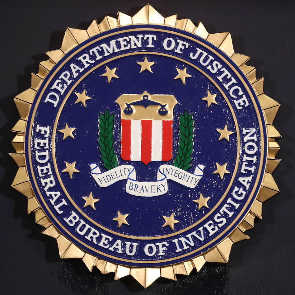 The FBI seal is attached to a podium prior to Director is Christopher A. Wray speaking at a news conference at FBI Headquarters, on June 14, 2018 in Washington, D.C. after the release of an inspector general's report. (Mark Wilson/Getty Images)