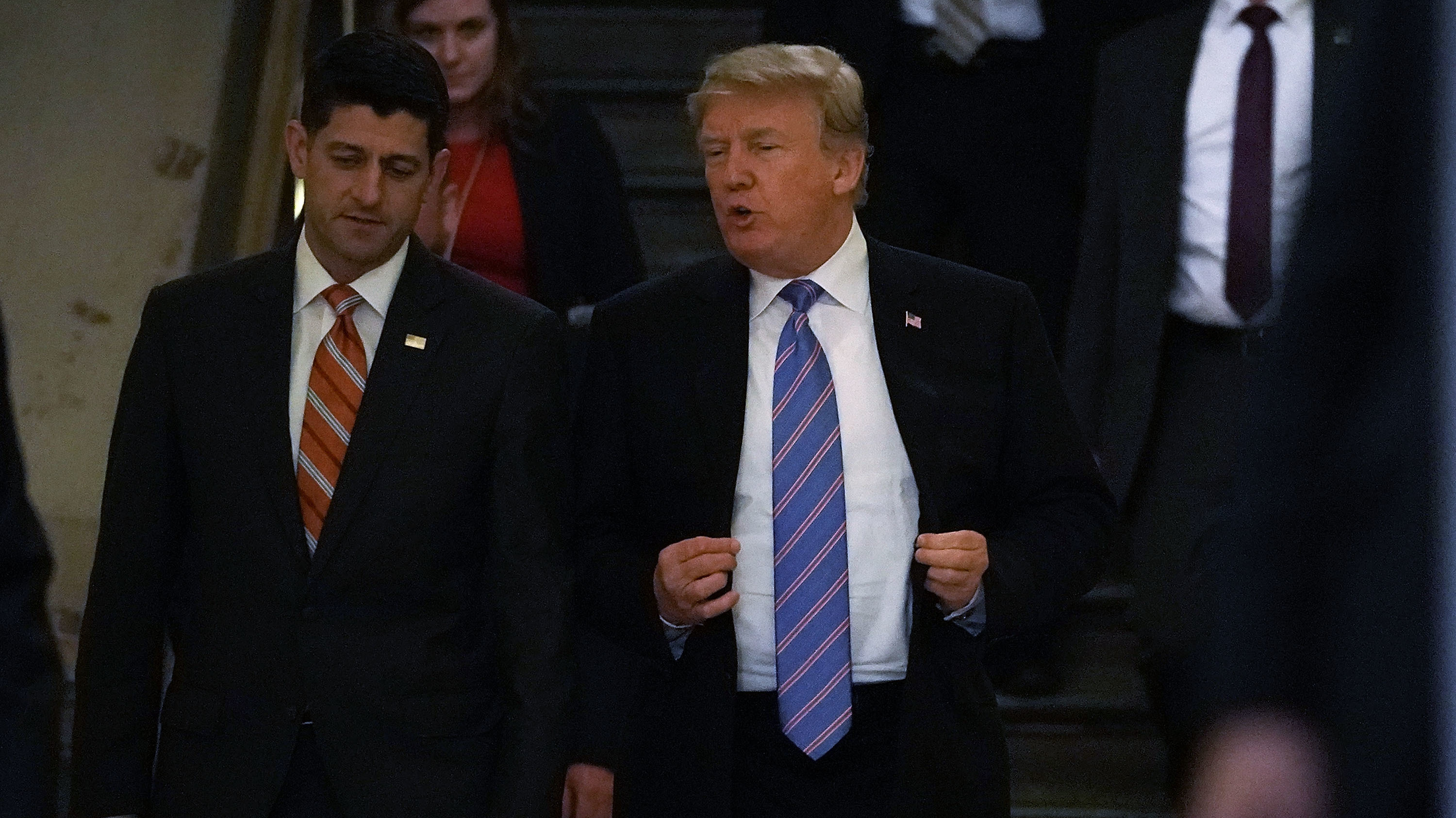 Accompanied by Speaker of the House Paul Ryan, R-Wis., President Trump arrives at a meeting with House Republicans at the U.S. Capitol Tuesday. (Getty Images)