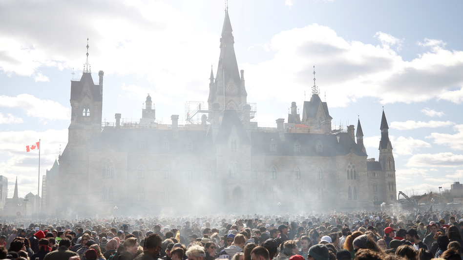 Canada's House of Commons voted to legalize recreational marijuana use, sending the bill to the Senate. In this photo from April 20, smoke rises during the annual 4/20 marijuana rally on Parliament Hill in Ottawa, Ontario. (Chris Wattie/Reuters)