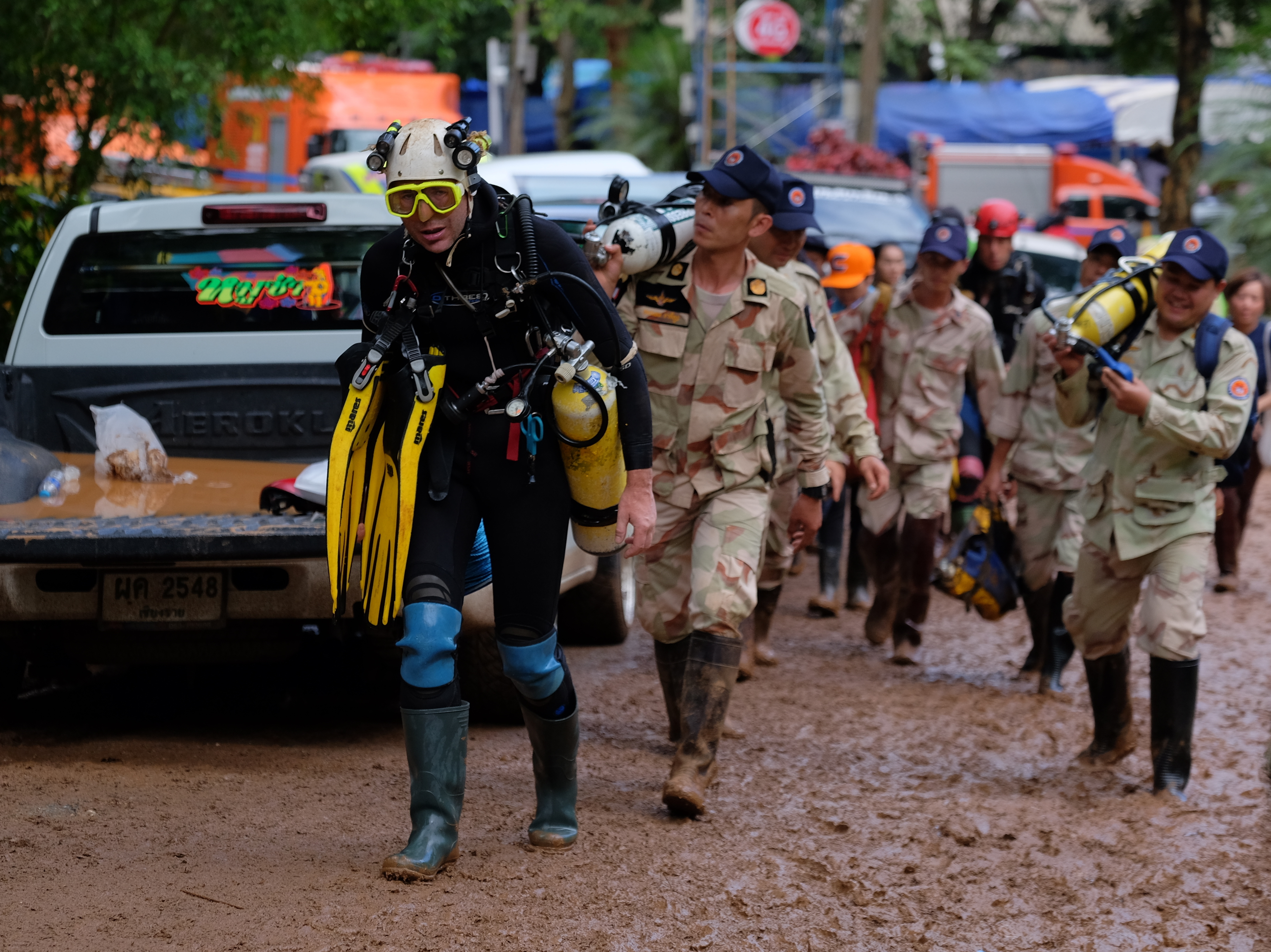 British cave-diver John Volanthen walks out of the flooded Tham Luang cave on Thursday. Rescue teams in Thailand have been working around the clock to save 12 boys and their soccer coach who went missing Saturday evening. (Getty Images)