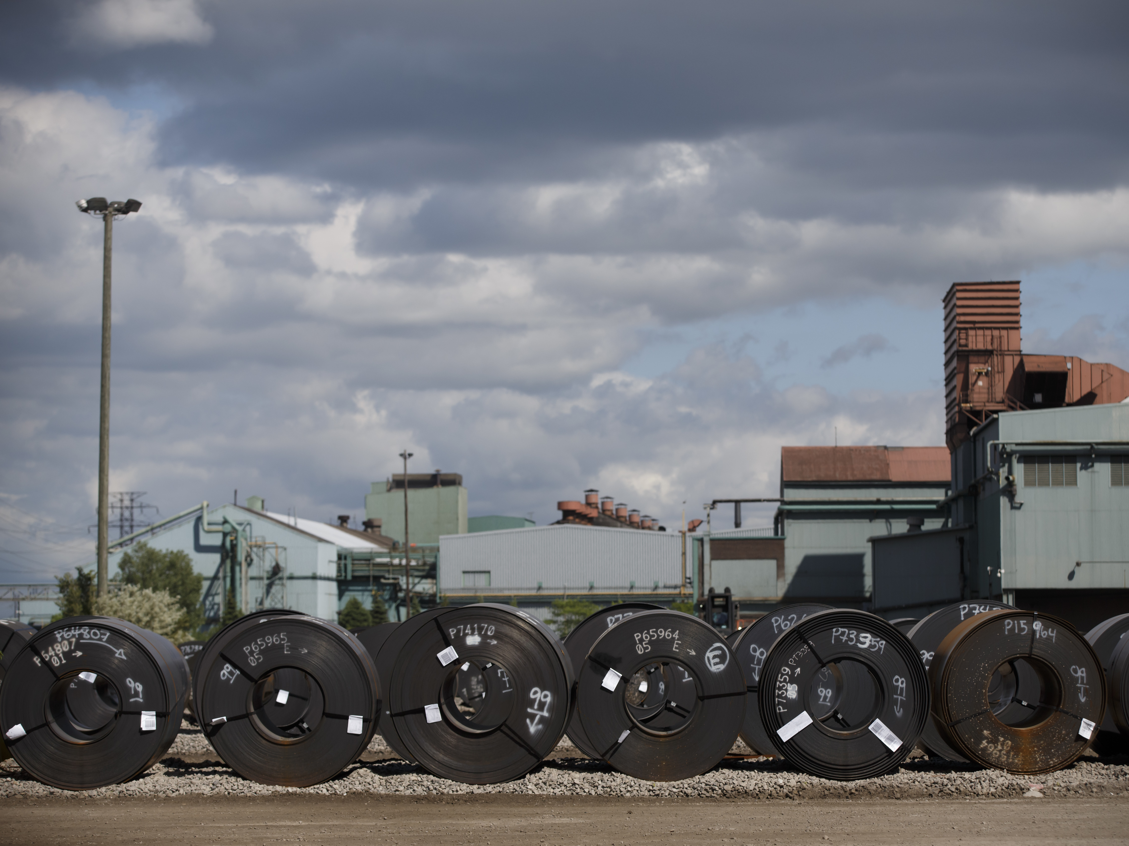 Steel coils lay in a yard at the ArcelorMittal Dofasco steel plant in Hamilton, Canada. President Trump recently announced tariffs on Canadian steel and aluminum imports. (Getty Images)