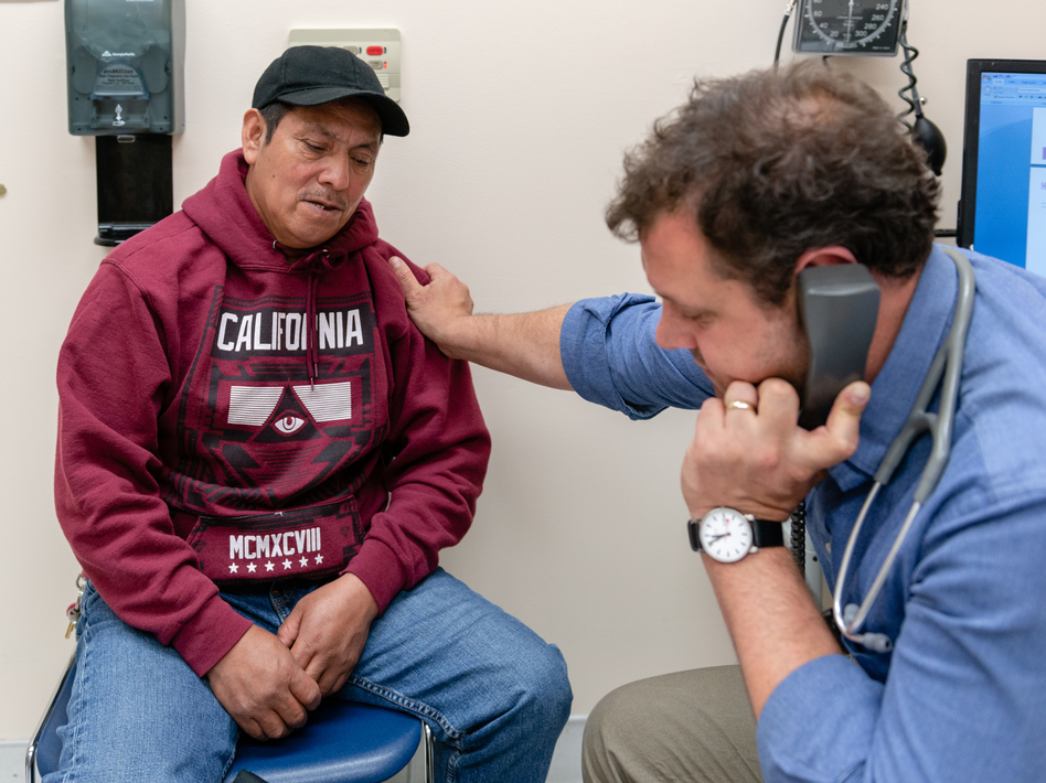 Juan Lopez Aguilar (left), a Maya man who fled violence in Guatemala three years ago, tells Dr. Nick Nelson he fears returning to the land of his birth. "There are a lot of gangs," he tells the doctor. "They want to kill people in my community."