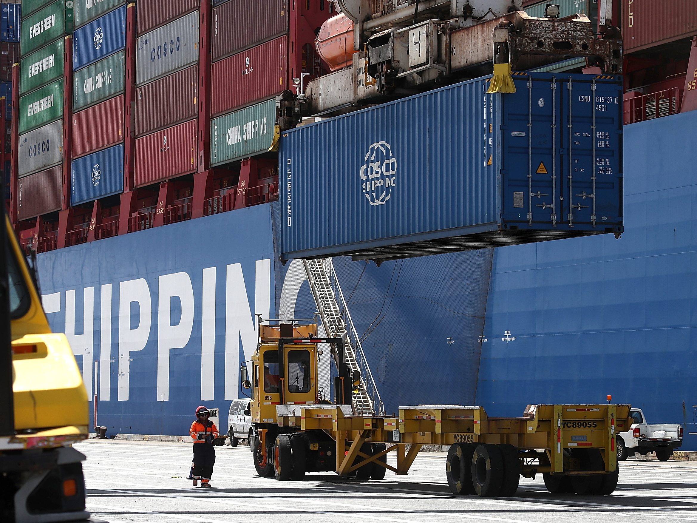 A shipping container is offloaded from the Hong Kong-based ship in Oakland, Calif., last month. (Getty Images)