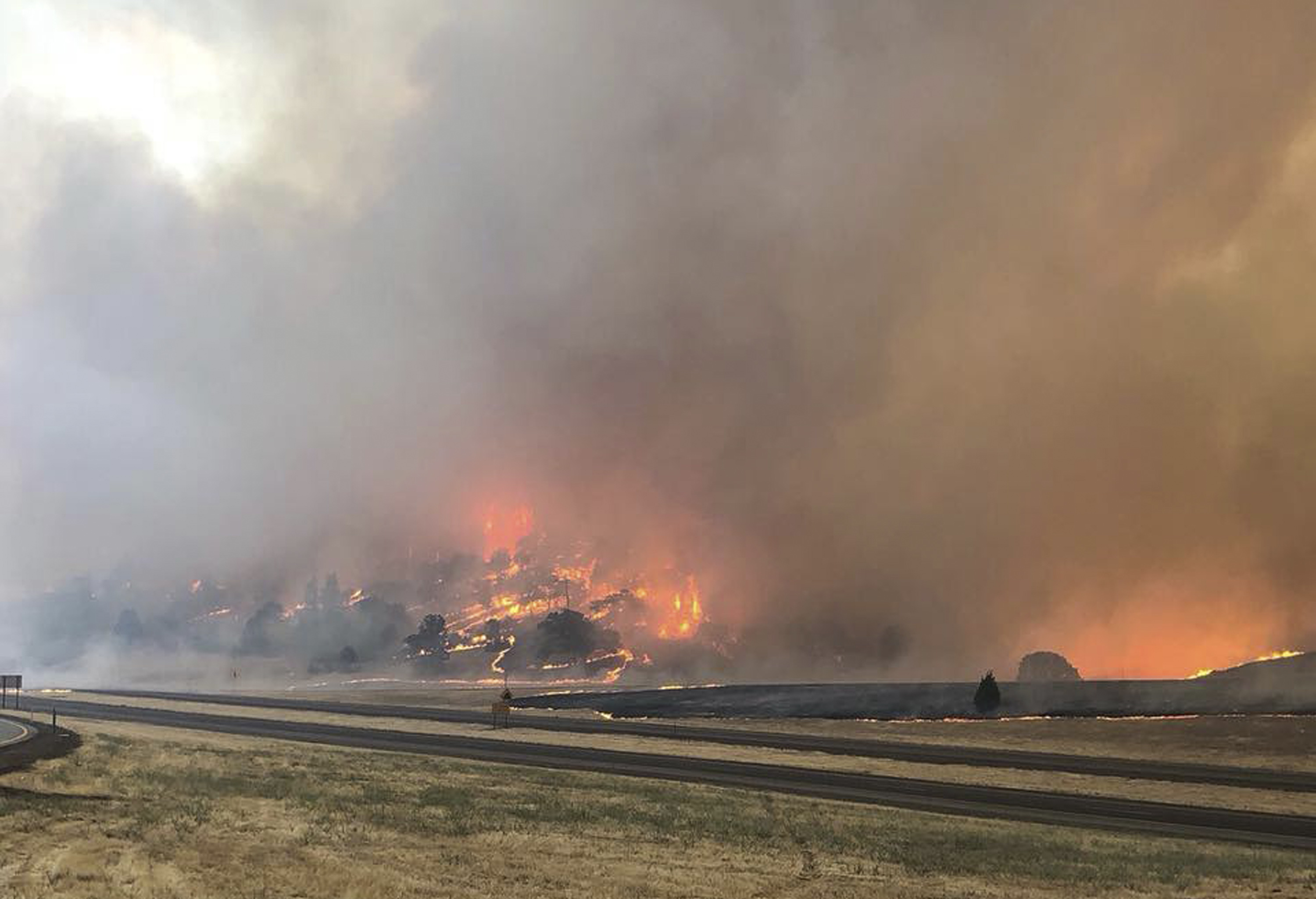 At least 1 dead as fires across California force evacuations, burn homes