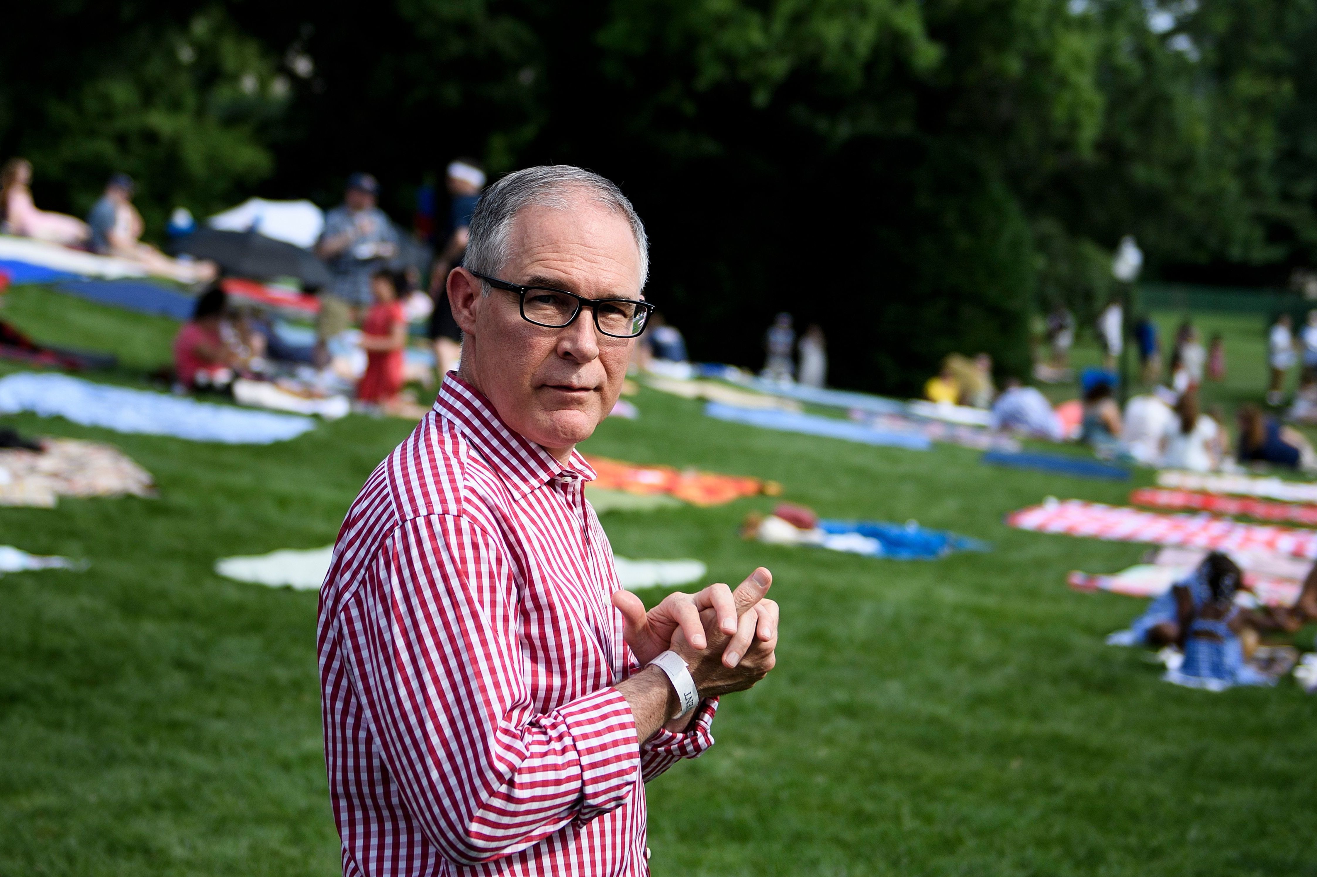 Scott Pruitt attends a picnic for military families at the White House on July 4, a day before he was forced out of as head of the Environmental Protection Agency for various alleged ethical lapses. (AFP/Getty Images)