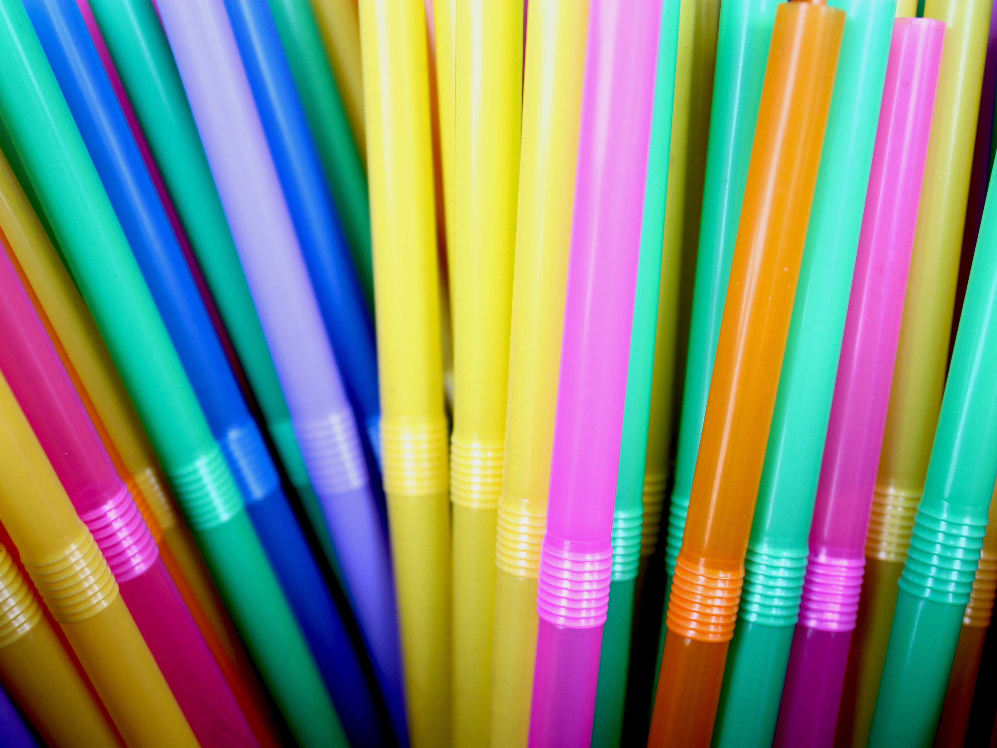 As cities and companies — including Starbucks — move to oust straws in a bid to reduce pollution, people with disabilities say they're losing access to a necessary, lifesaving tool. (EyeEm via Getty Images)
