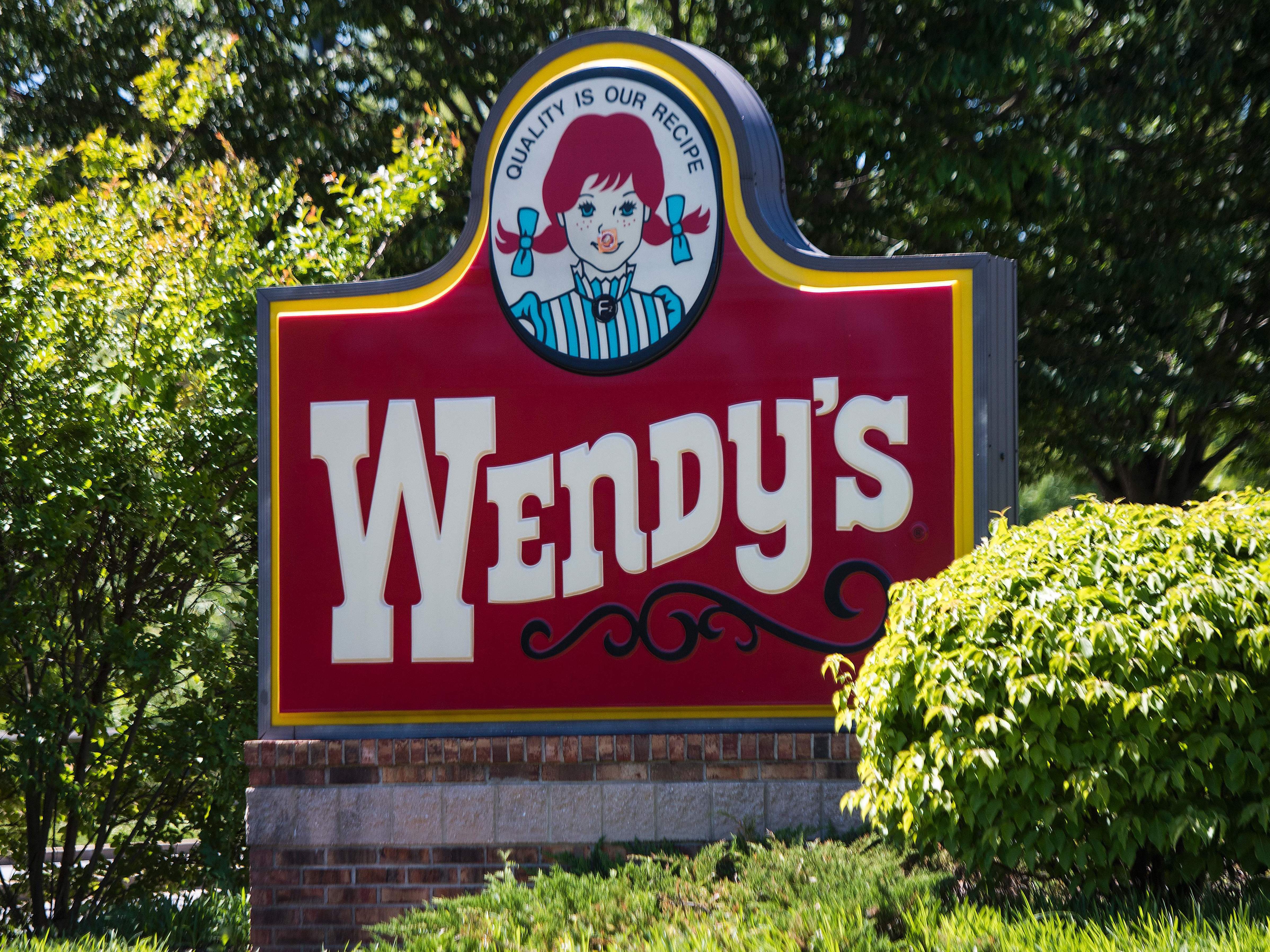 Ten states and the District of Columbia are investigating Wendy's and other fast-food chains over the use of &quot;no poach&quot; agreements that limit the ability of workers to switch jobs. (AFP/Getty Images)