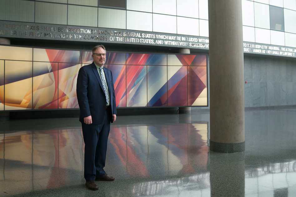 Acting U.S. Census Bureau Director Ron Jarmin stands in the lobby of the agency's headquarters in Suitland, Md. The bureau is facing six lawsuits from more than two dozen states and cities, plus other groups, that want a new question about U.S. citizenship removed from the 2020 census.