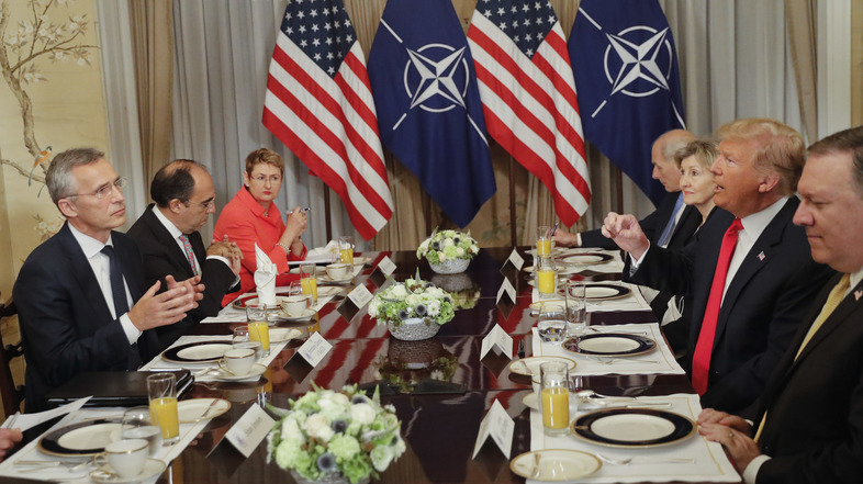 In what was supposed to be a brief photo op ahead of a breakfast meeting, President Trump launched a verbal attack against NATO defense spending as cameras clicked away. (Pablo Martinez Monsivais/AP)