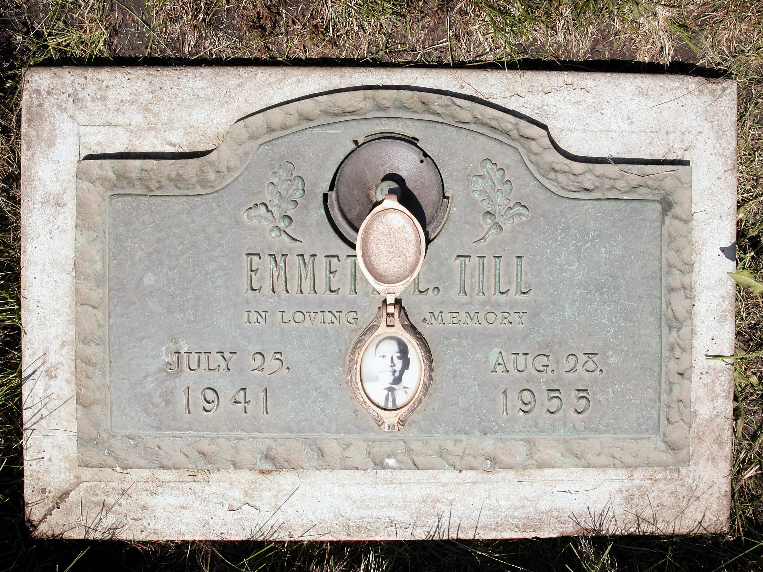 A plaque marks the gravesite of Emmett Till at Burr Oak Cemetery in Aslip, Ill. No one was convicted in his 1955 lynching. (Getty Images)