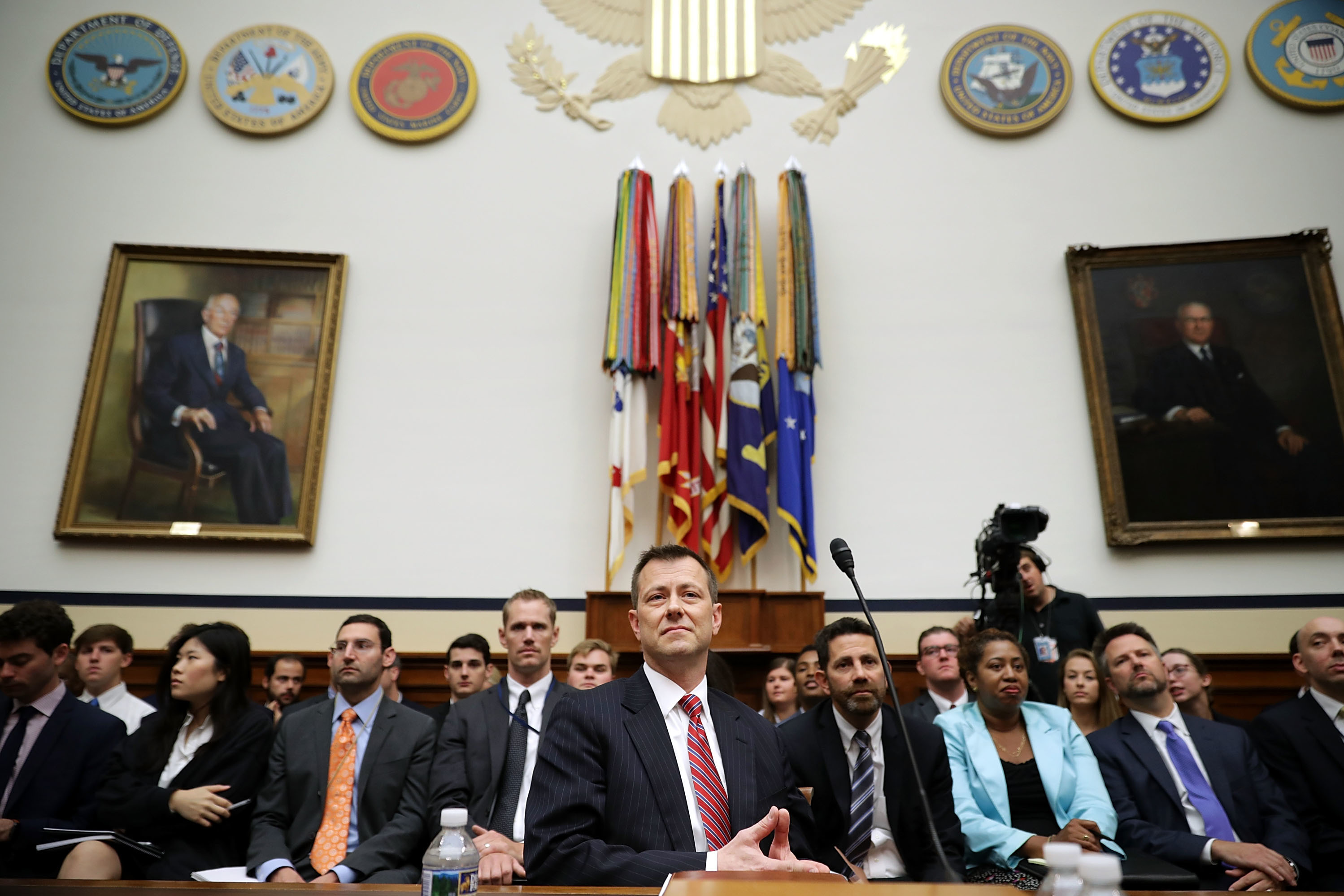 Deputy Assistant FBI Director Peter Strzok (center) waits to testify before a joint committee hearing of the House Judiciary and Oversight and Government Reform committees on Capitol Hill Thursday. (Getty Images)