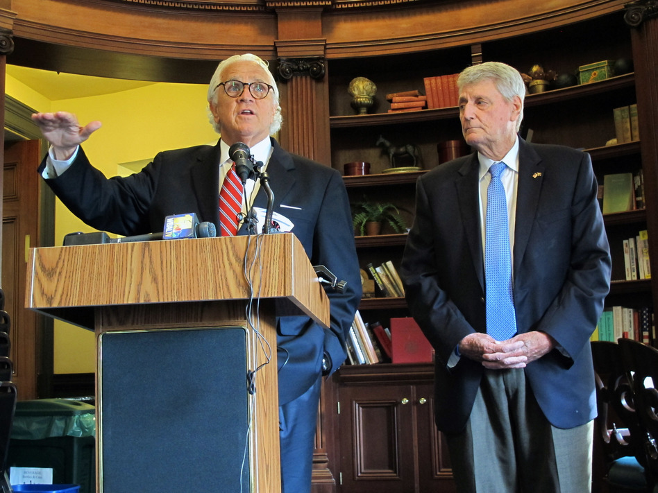 Maryland Senate President Mike Miller (left) and House Speaker Michael Busch discuss an FBI briefing they received about Russian links to a company that maintains part of the state's voter registration platform during a news conference in Annapolis, Md. (Brian Witte/AP)