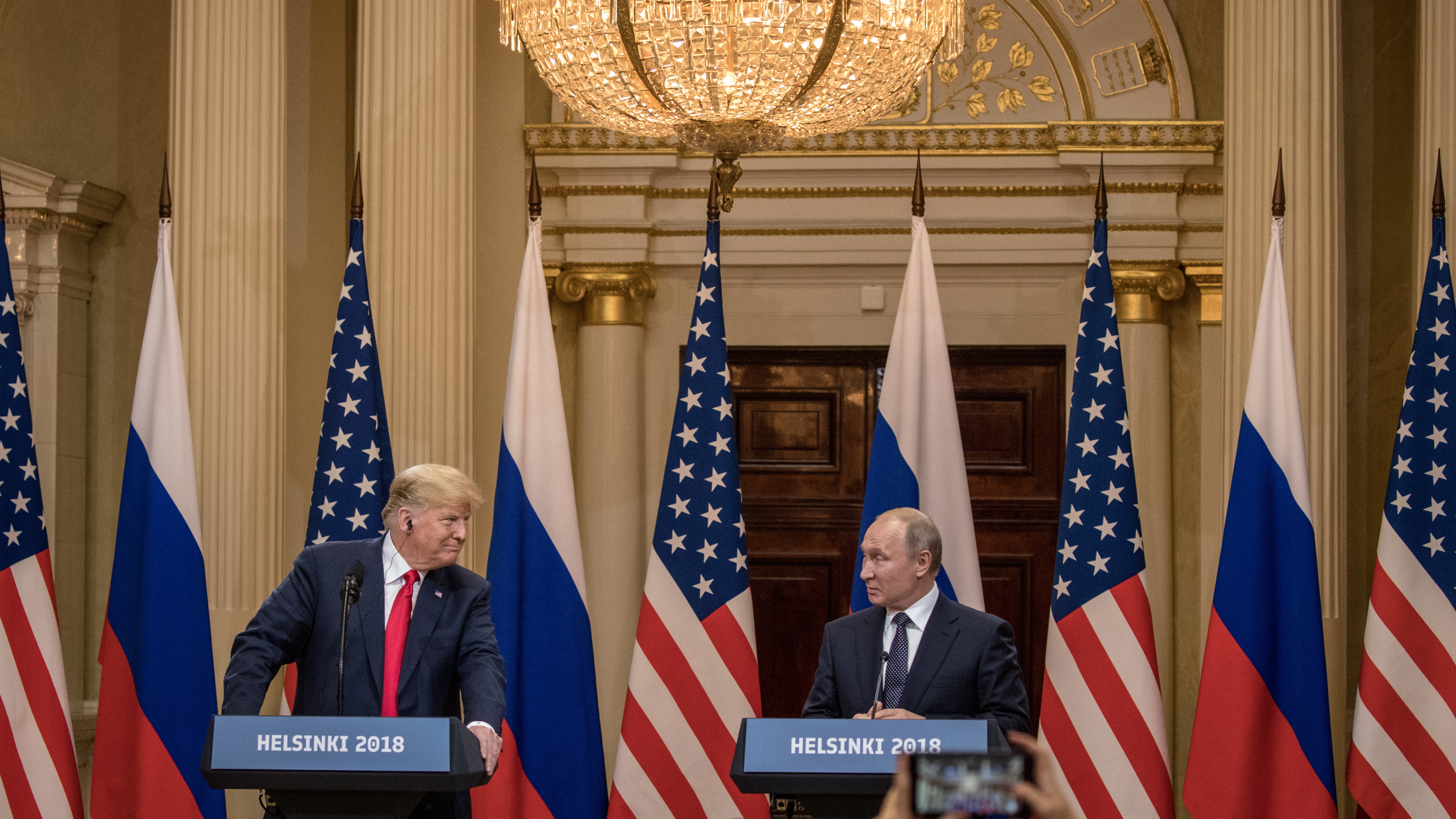 President Trump and Russian President Vladimir Putin speak to the media during a joint press conference after their summit on Monday in Helsinki. (Getty Images)