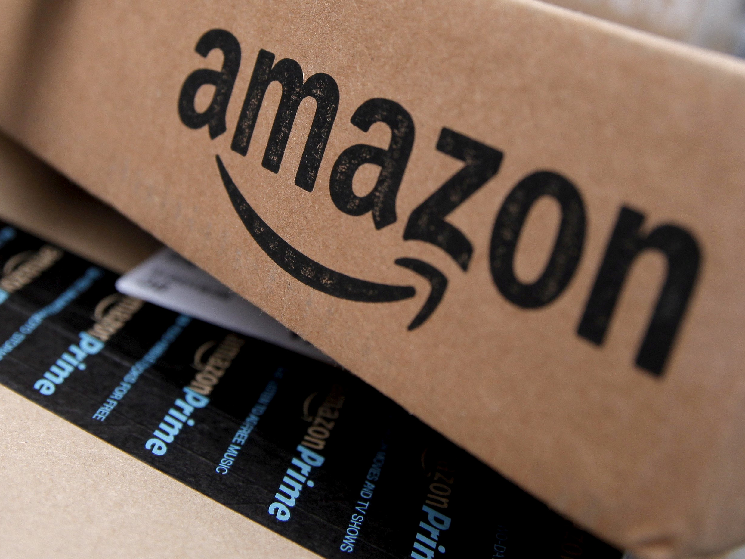 In shadow marketplaces, positive reviews for Amazon products are bought and sold. The company says it's cracking down and that it estimates that less than 1 percent of reviews are fake. (Reuters)